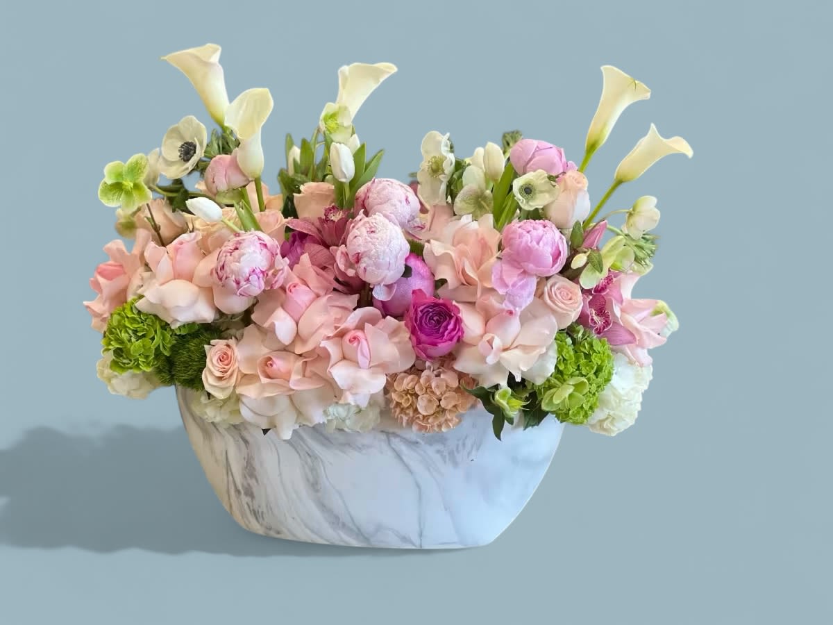 Reflections - A refreshing mix of Roses, Calla Lilies, Cymbidium Orchids, Tulips, Hydrangea, Peonies and other seasonal blooms