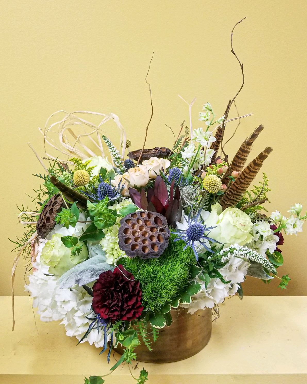 Earth - Elements Luxury Line - This arrangement is in a large gold cylinder and is inspired by earth's many tones and is textures. 