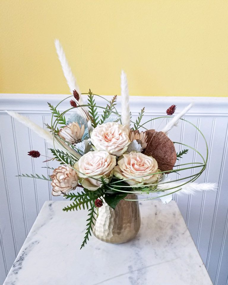 Golden Serenity Bouquet - The combination of pale pink roses, white blooms, dried blooms and the elegant gold vase exudes a sense of tranquility and sophistication. It’s perfect for brightening any space or as a thoughtful gift.  approx dimensions  12 X 16