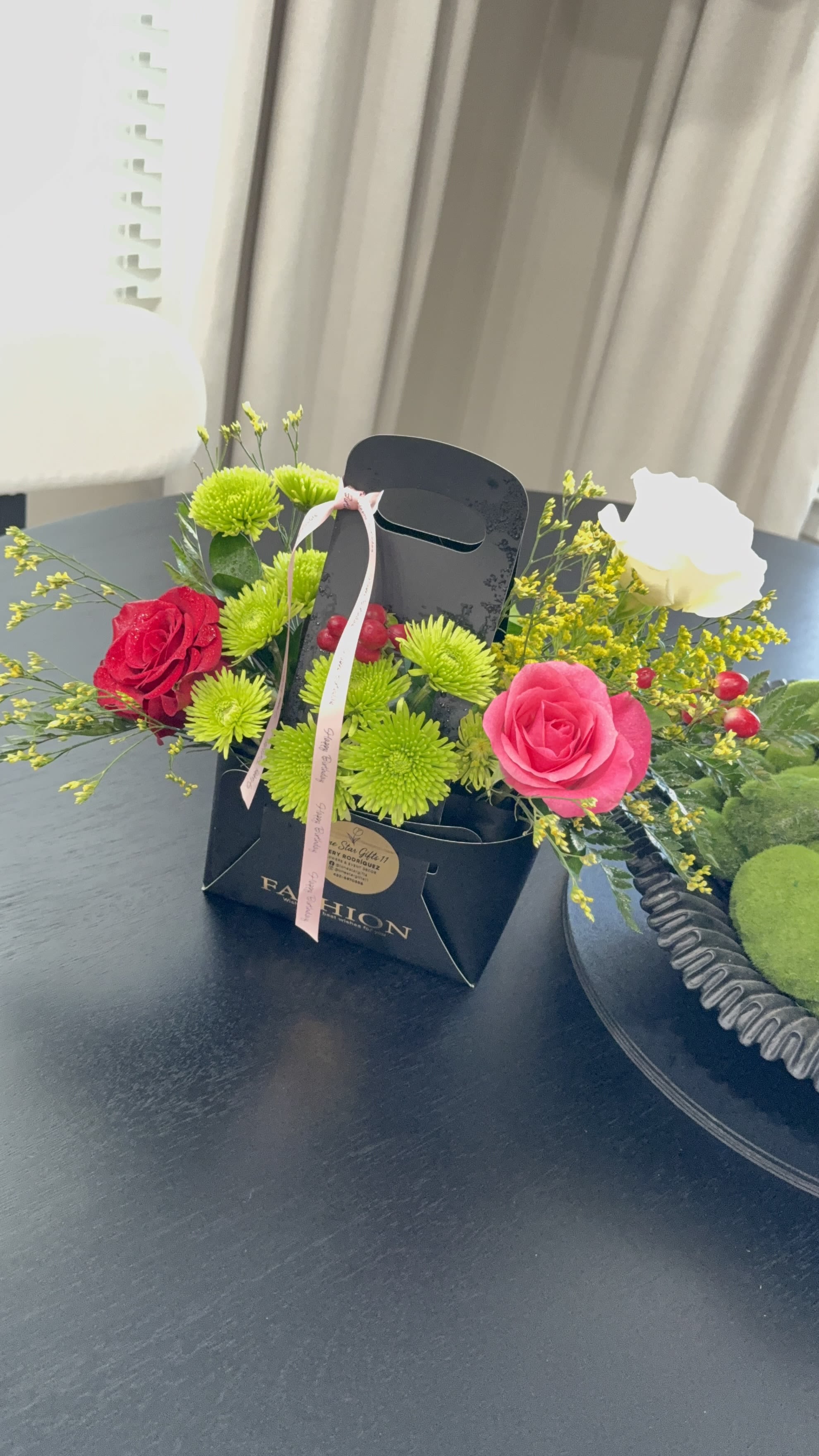 Rose Flower Box – Birthday Flower Delivery in Midland TX | Local Florist Midland Odessa - Looking for modern flower delivery in Midland, TX? This elegant rose flower box is a perfect choice for birthdays, office celebrations, or everyday surprises. Designed in a sleek black box, this arrangement features premium roses accented with fresh seasonal greenery and complementary filler flowers for a full and vibrant look. As a local florist in Midland, Texas, we create each arrangement fresh and made-to-order. Flower varieties and shades may vary based on availability while maintaining the overall design and color palette shown. Lone Star Gifts proudly offers same-day flower delivery in Midland, Odessa, and surrounding West Texas areas. If you are searching for birthday flowers in Midland TX, rose arrangements near me, or flower delivery Midland Texas, this design is a beautiful and reliable choice