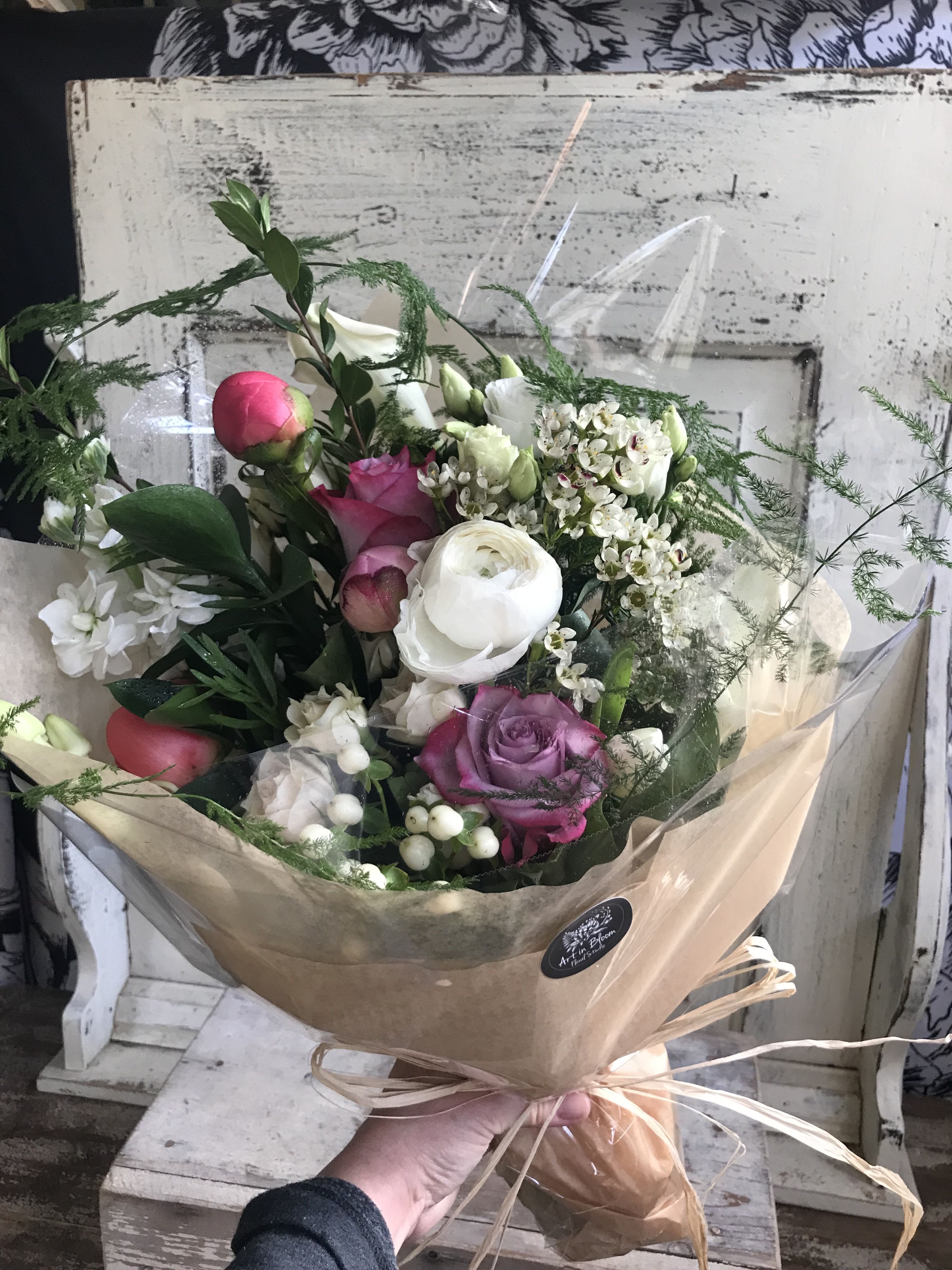 Designer's Choice Bouquet- no vase - Let our designers select the nicest blooms from our inventory to create a gorgeous fresh bouquet that fits the season. The bouquet will be delivered with a water pack at the base for optimum freshness.