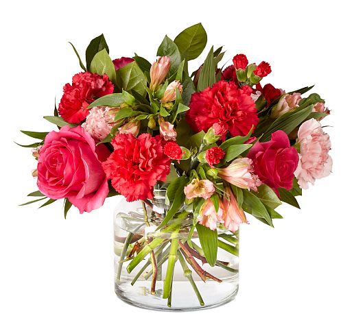 You're Precious Bouquet - Brighten up your home with this gorgeous bouquet. A handcrafted blend of roses, carnations, and more set in a clear glass cylinder vase creates a gorgeous array of pink  blooms.