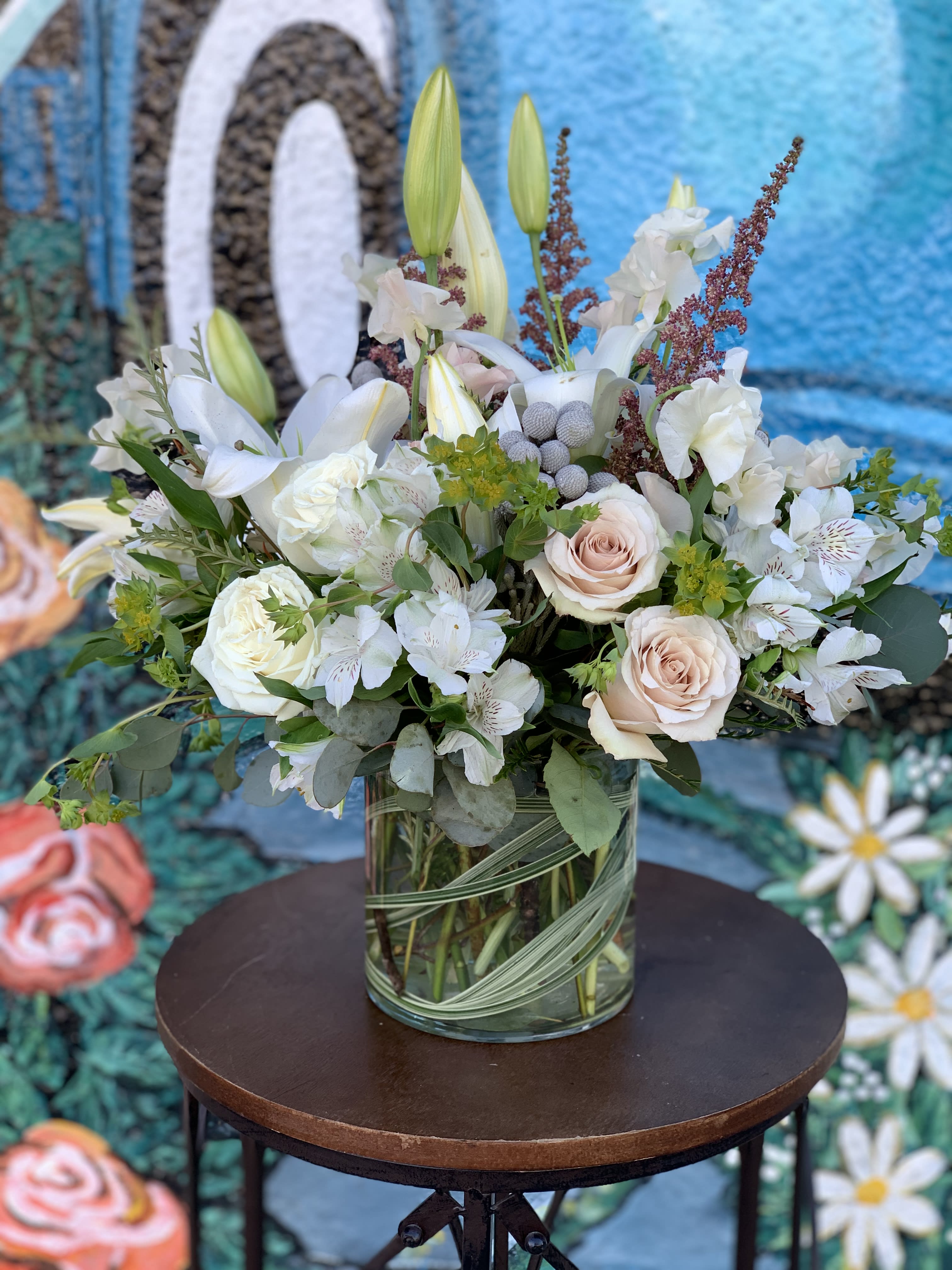 Palazzo - Seasonal flowers arranged in a vase. 