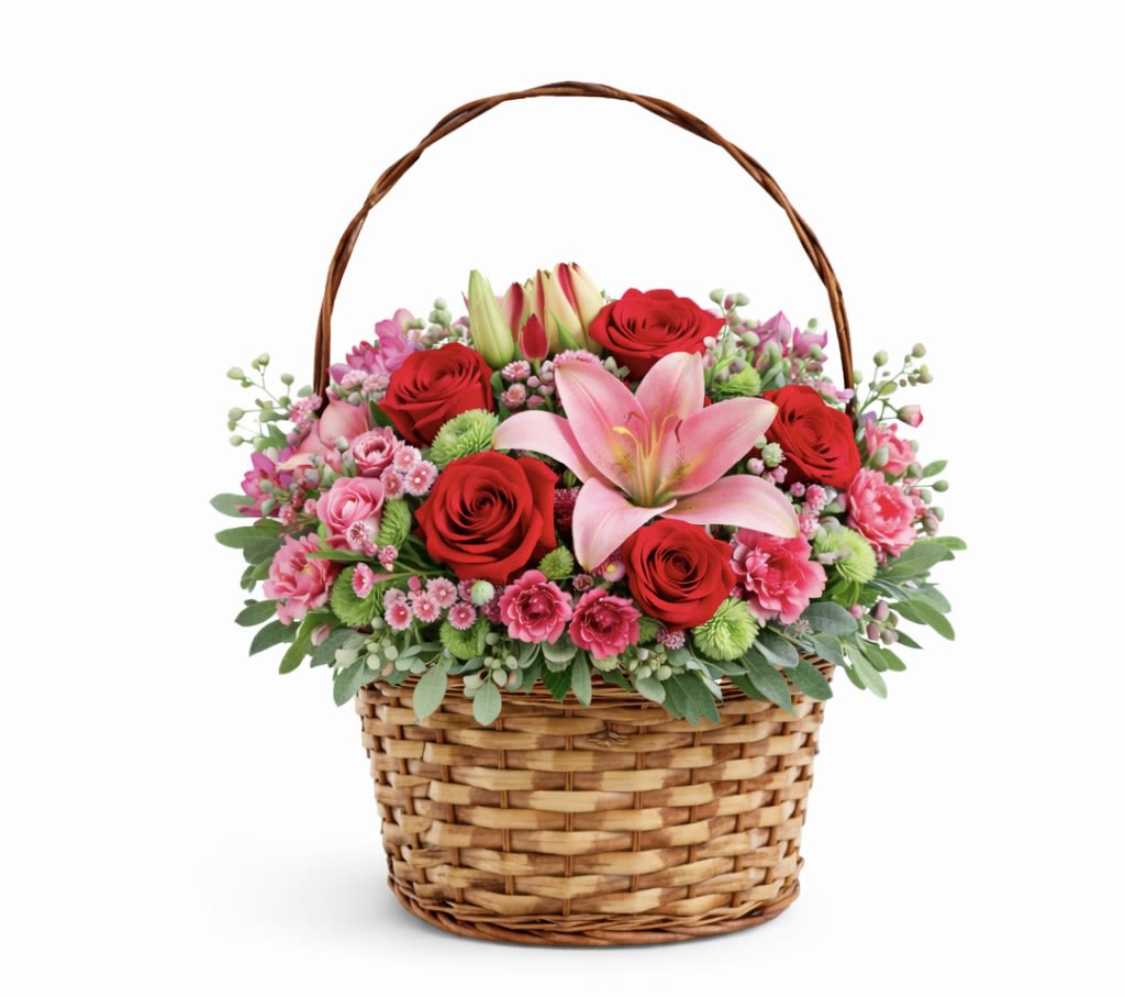 Sweetheart Basket - A charming Valentine’s basket designed with a romantic mix of red and pink blooms, finished with fresh greenery for a soft, classic look. Perfect for a sweet surprise that still feels full and beautiful.  Each piece is Designer’s Choice, created with fresh seasonal blooms. Flowers and colors may vary based on availability while maintaining the overall style and quality.  Better for: Mother’s Day, Valentine’s Day, Anniversary, Love &amp; Romance, Birthday, Thinking of You, Just Because.