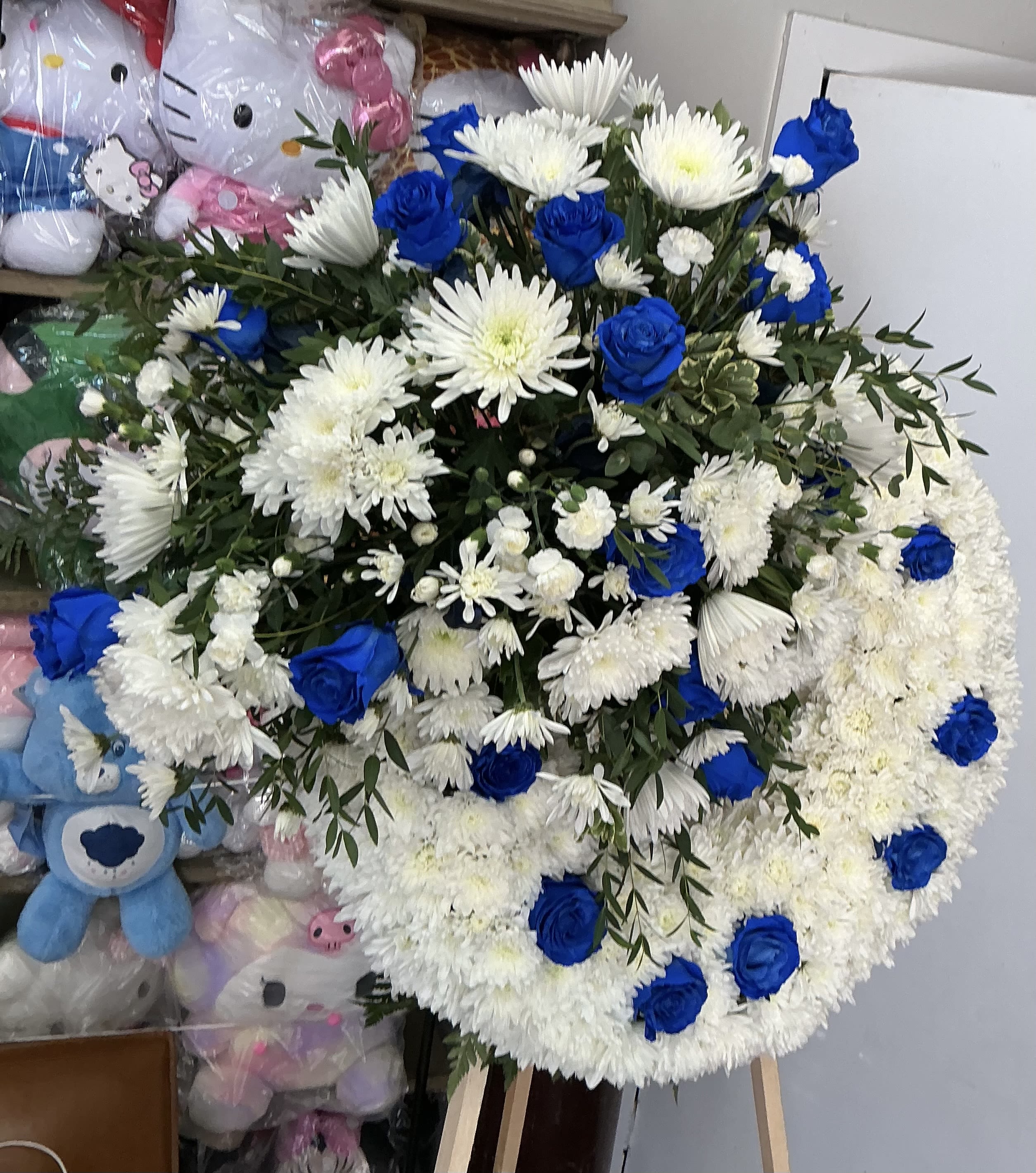 "Heavenly Father" Sympathy Arrangement - A georgeus crown made of blue roses 