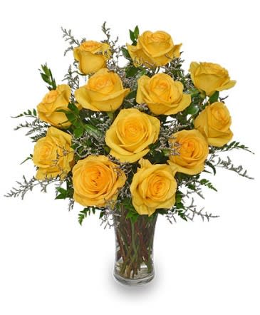 LEMON DROP ROSES DOZEN BOUQUET - Yellow is the true color of friendship with these sunny roses. Complemented by misty blue limonium, our Lemon Drop roses are a beautiful way say you care.