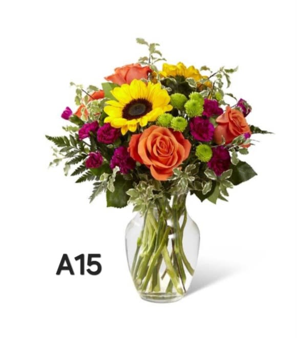 A15 - It sunflowers, orange roses, purple mini carnations and other flowers
