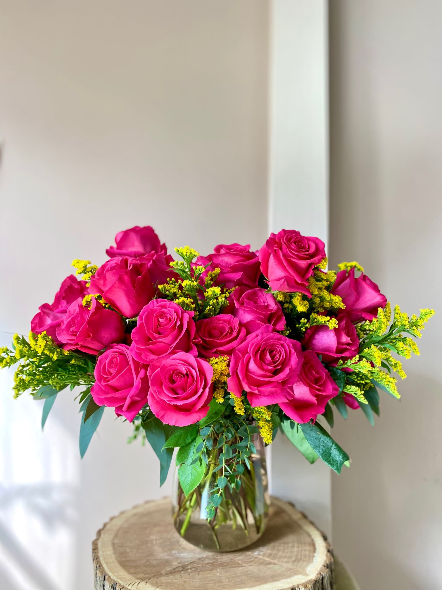 Be your own Muse - Gorgeous pink rose arrangement (Standard: 18, Deluxe: 24, Premium: 36) accented with greenery and filler flowers. Simple BUT so Gorgeous! 