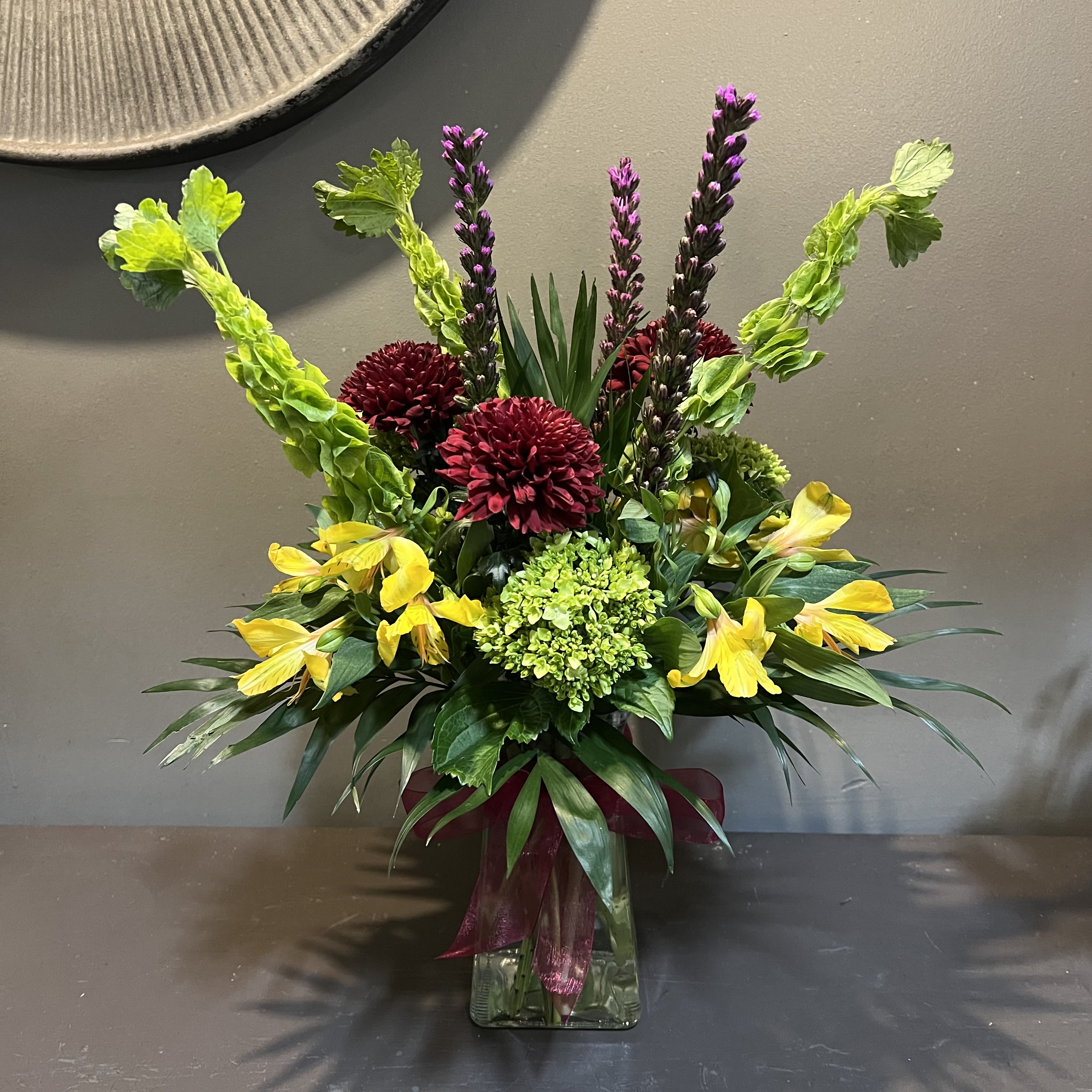 Mid-Height Garden Vase - A garden mix of flowers.  Measures approx. 20" tall x 16" diameter and arrives in a clear glass vase.