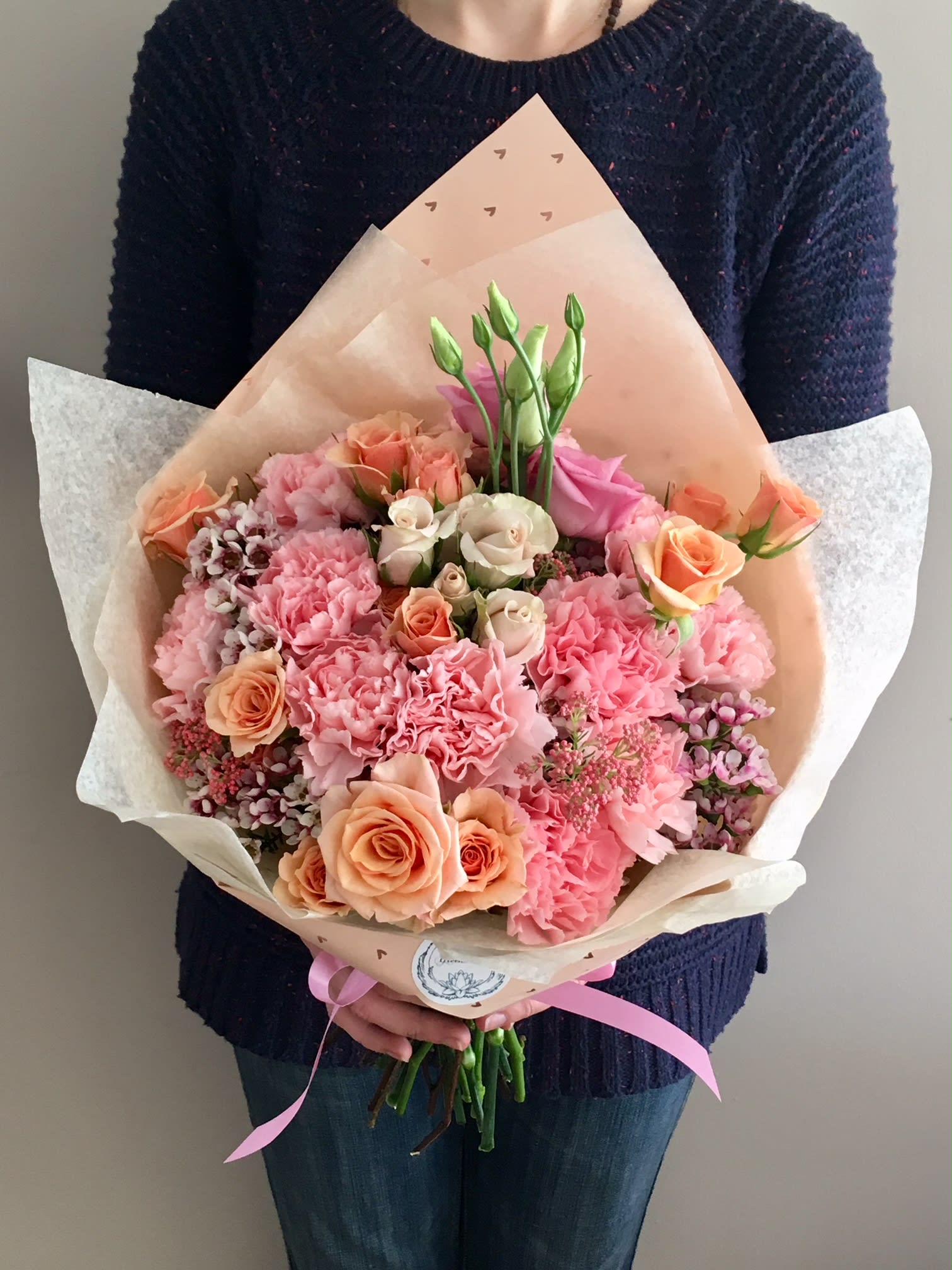 Pink is in the air! - For that Special Girl! You know who we're talking about! The one, who turns your heart around, who speaks straight to your Soul, who makes your life that special and who loves PINK (pink shoes, or pink lipstick, or just loves to sing along with PINK!).   * Spray roses * Fancy carnations - a tone of pink may vary upon availability * Waxflower This bouquet will come nicely wrapped for NO extra charge, but with extra WOW experience!