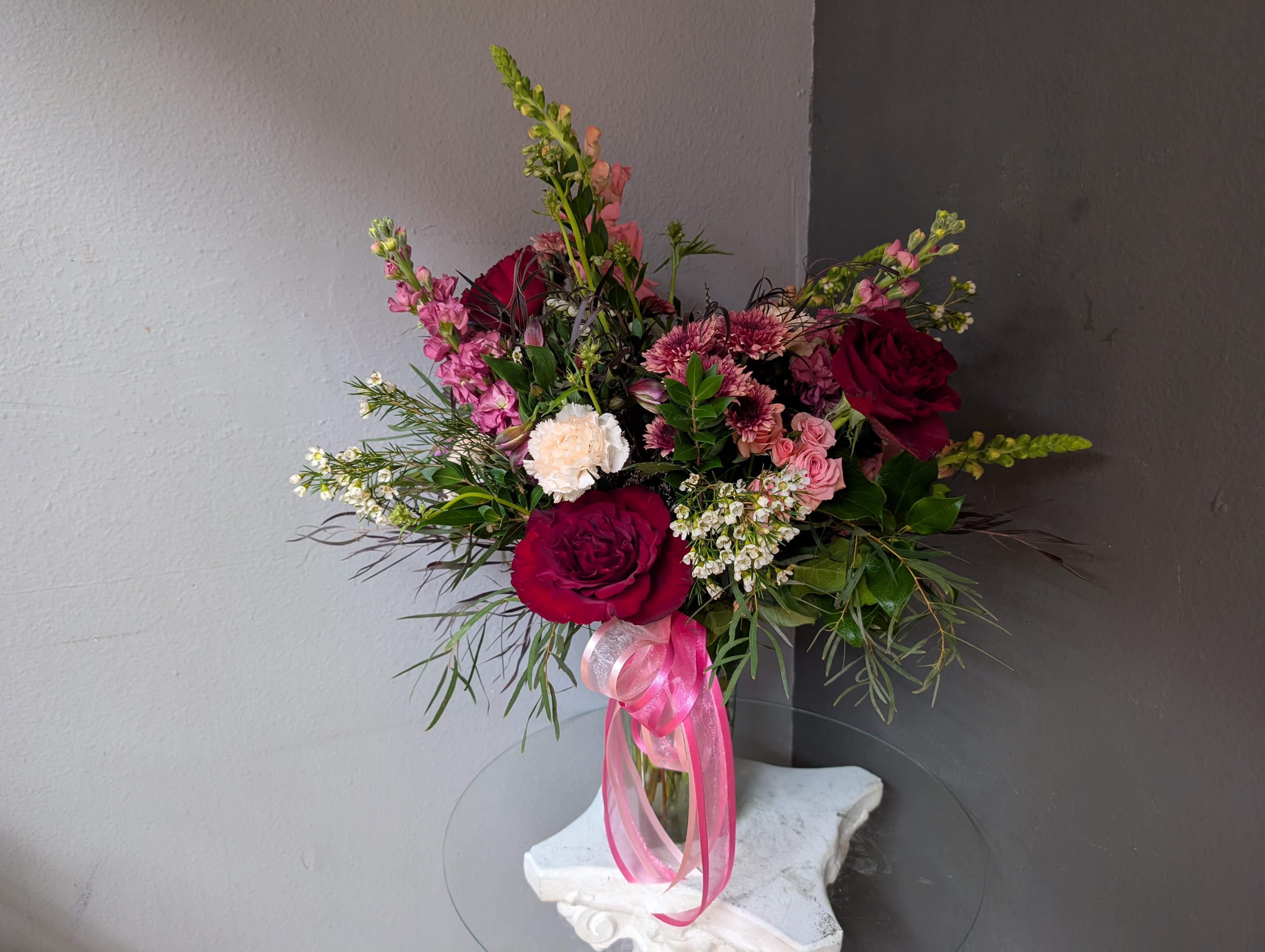 #725 Designer choice floral arrangement  - This beautiful flower arrangement of fresh mixed seasonal blooms is made by local designers in the heart Orange California. Hand crafted and perfect for every occasion, from birthdays and new babies to sympathy and just because. The best choice to show you are thinking of that special someone. Can be sent as a local delivery or in-store pickup. This is an original, one of a kind arrangement. Order now before it's too late!