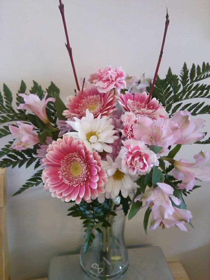 pretty in pink - pink gerbers, pink alstro,  pink carnations and white daisies