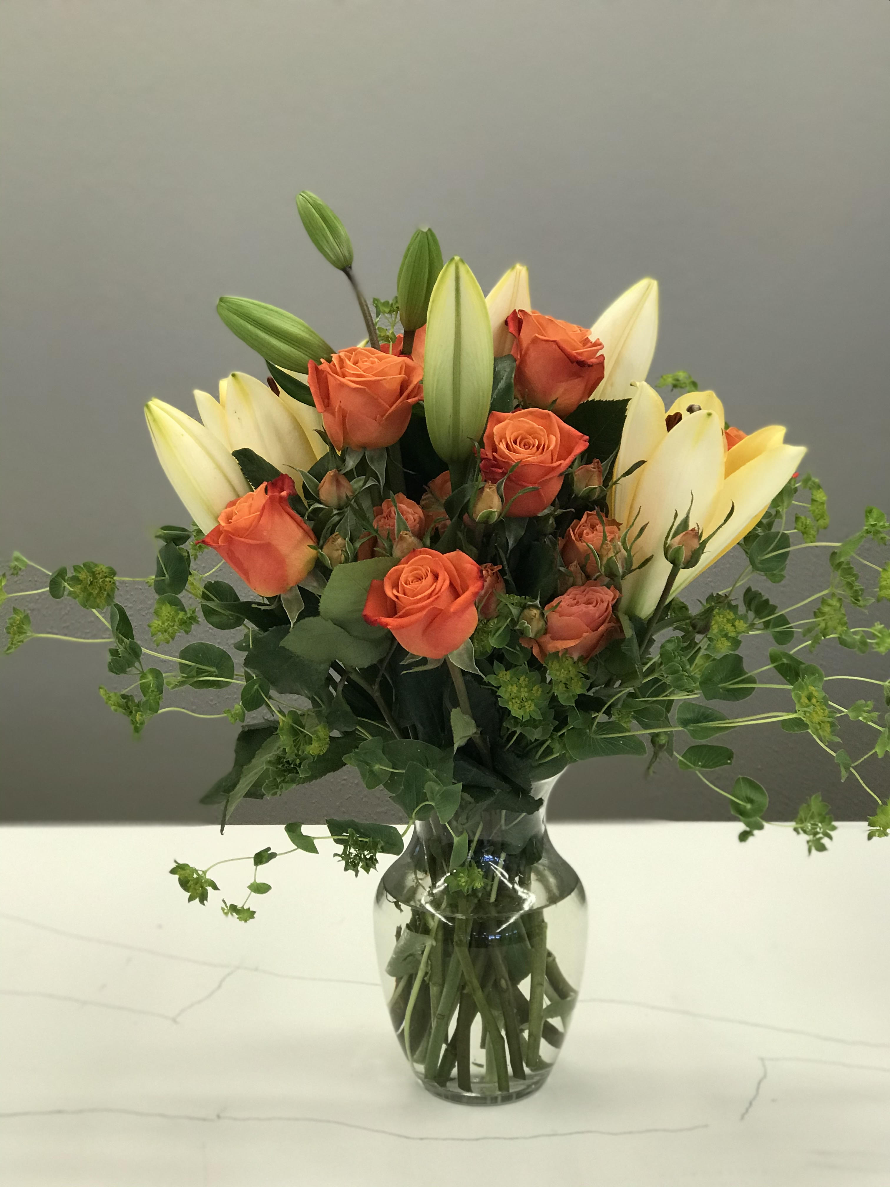 Persimmon Spice - Orange roses and cantaloupe lilies are ready to grace San Diego homes this Autumnal Season. 