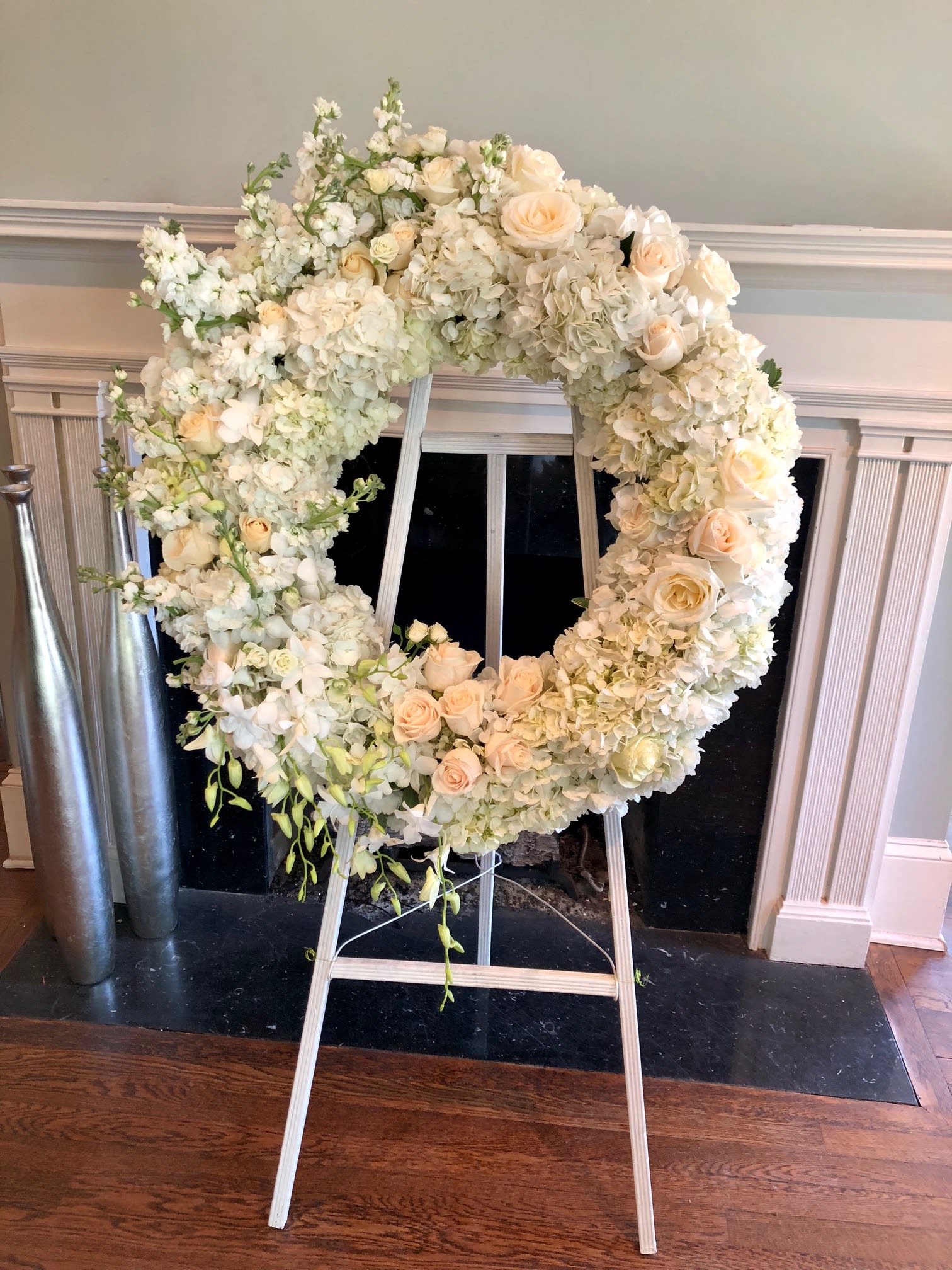 Love and Sincerity Wreath - This beautiful wreath will express your deepest love and devotion to all in attendance. Roses, Hydrangea, Stock and Dendrobium Orchids