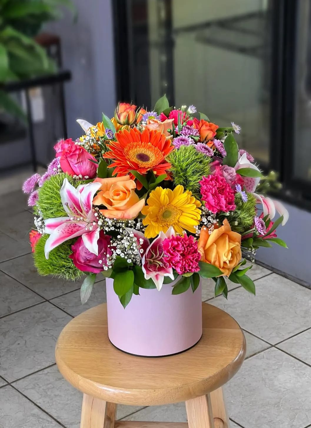 Bright Celebration - A sweet gift any day of the week! Warm, rich colors of pink, orange, yellow and lavender contrasted with fresh green - a special way to celebrate any occasion Orientation: All Around
