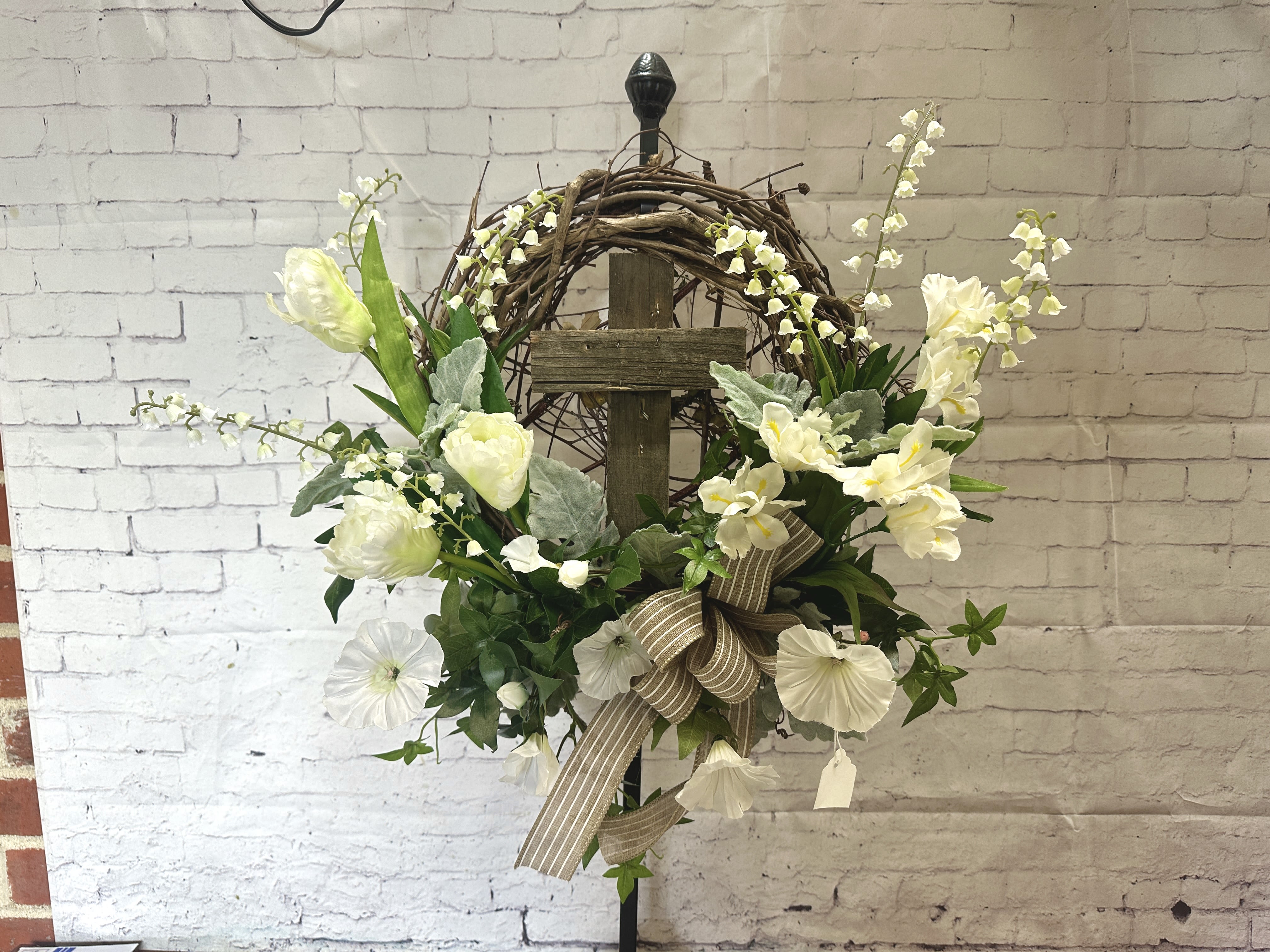 Artificial flower cross wreath  - Wreath with artificial white flowers and a wood cross