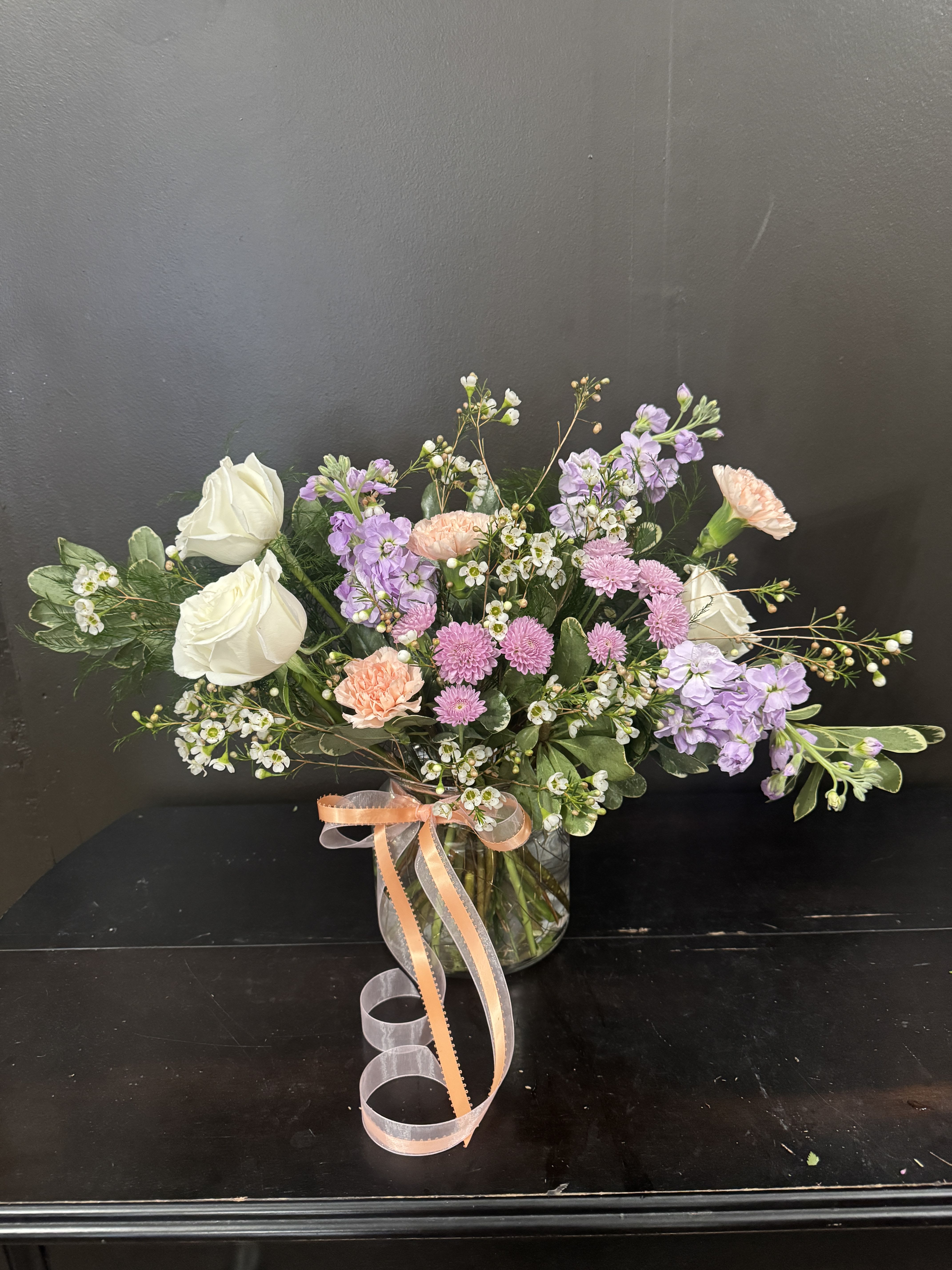 Lavender Fields  - An arrangement of purples pinks and whites. Specific flowers may vary based on availability.
