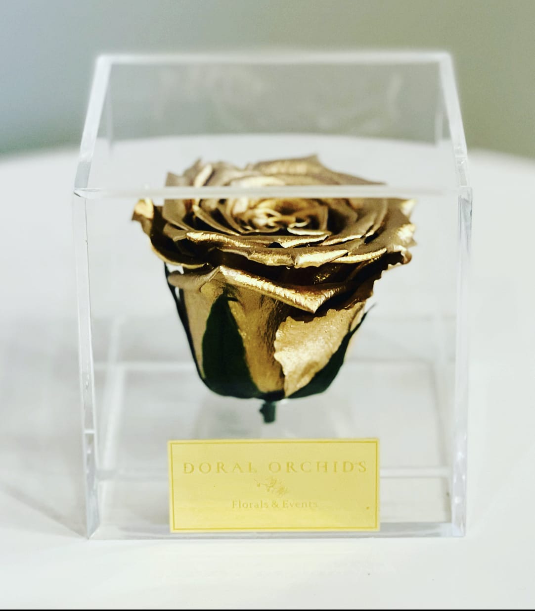 Forever Rose Gold ™ - A single preserved gold rose encased in a crystal-clear acrylic box. Lasting 3 or more years, it’s a striking symbol of luxury and timeless beauty.