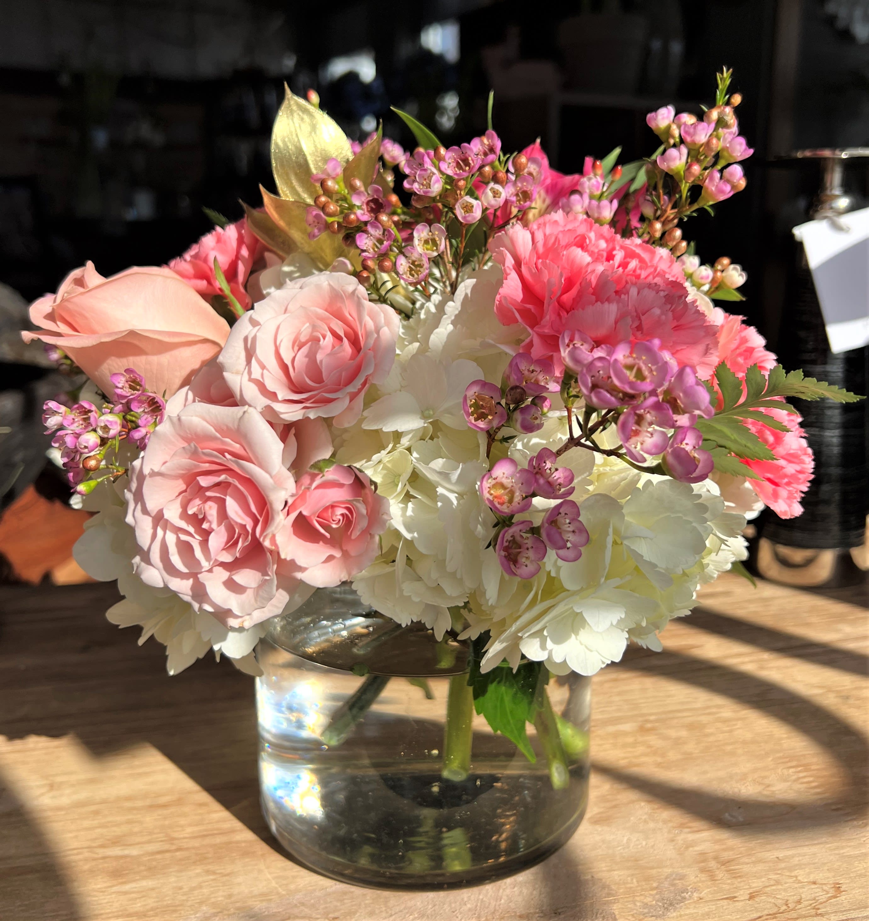 Just For You - A pretty mix of pinks and whites in a modern cylinder vase. Any substitutions due to flower market availability will be of equal value and color. 