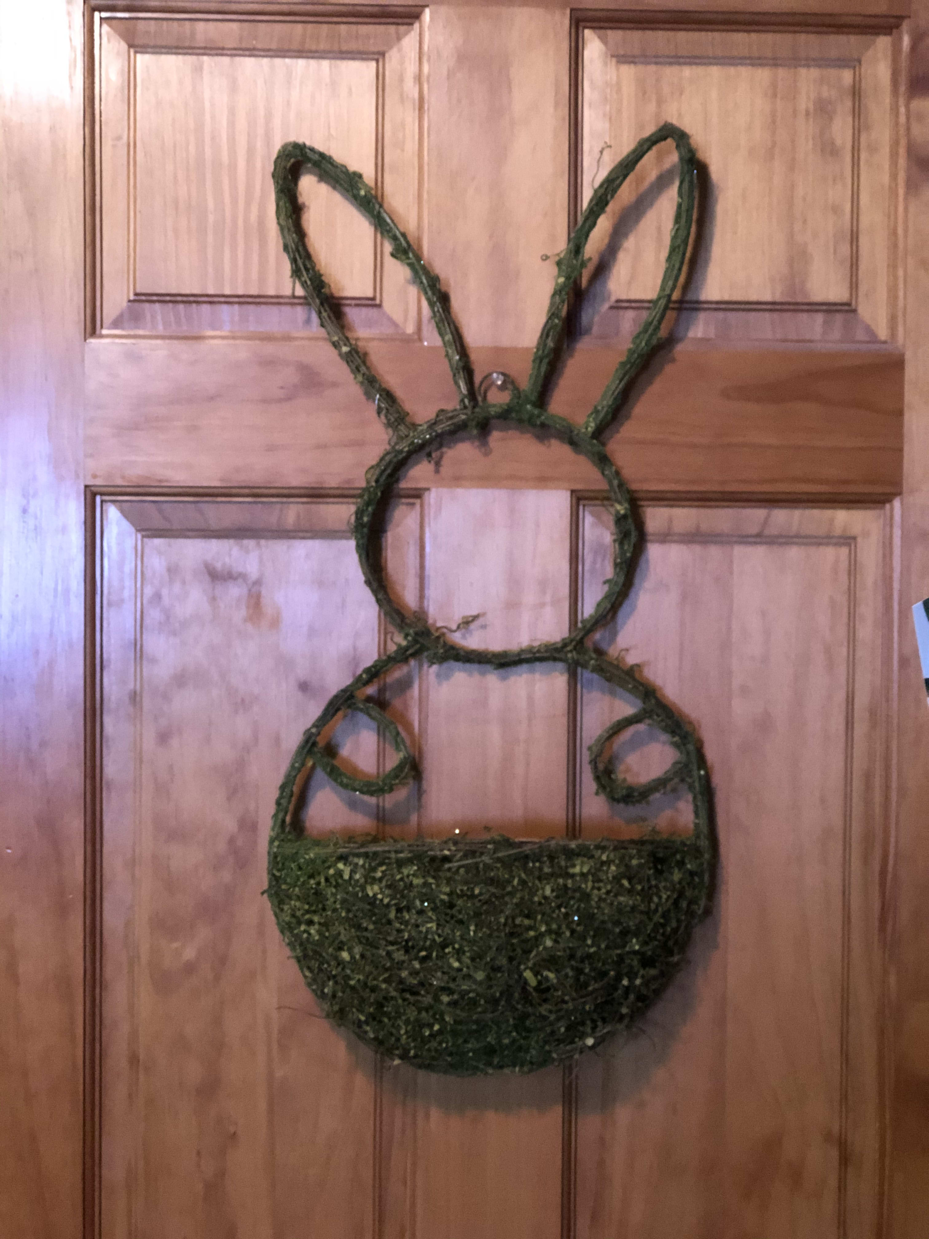 Bunny Wall Hanging - NEW: Bunny wall hanging is 24" from tip of his ears to the bottom of the basket. If you choose Deluxe, we will fill with our prettiest, freshest silk blooms that Kathy has to fill the basket. Picture is a rendition of what a deluxe may look like. (based on availability for that week.) Premium will fill the basket with the most beautiful of permanent silk blooms for a (long living keepsake.)