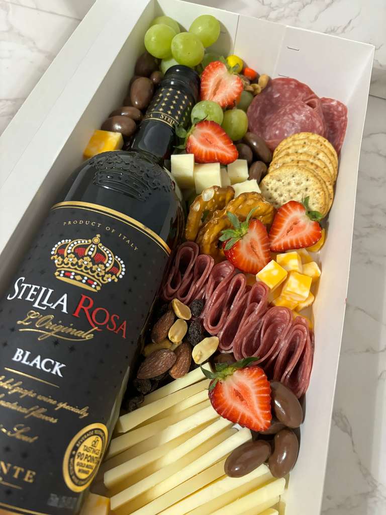 Charcurterie Wine Box  - Different cheeses, meats, fruits, crackers. Stella Rose Black Bottle 
