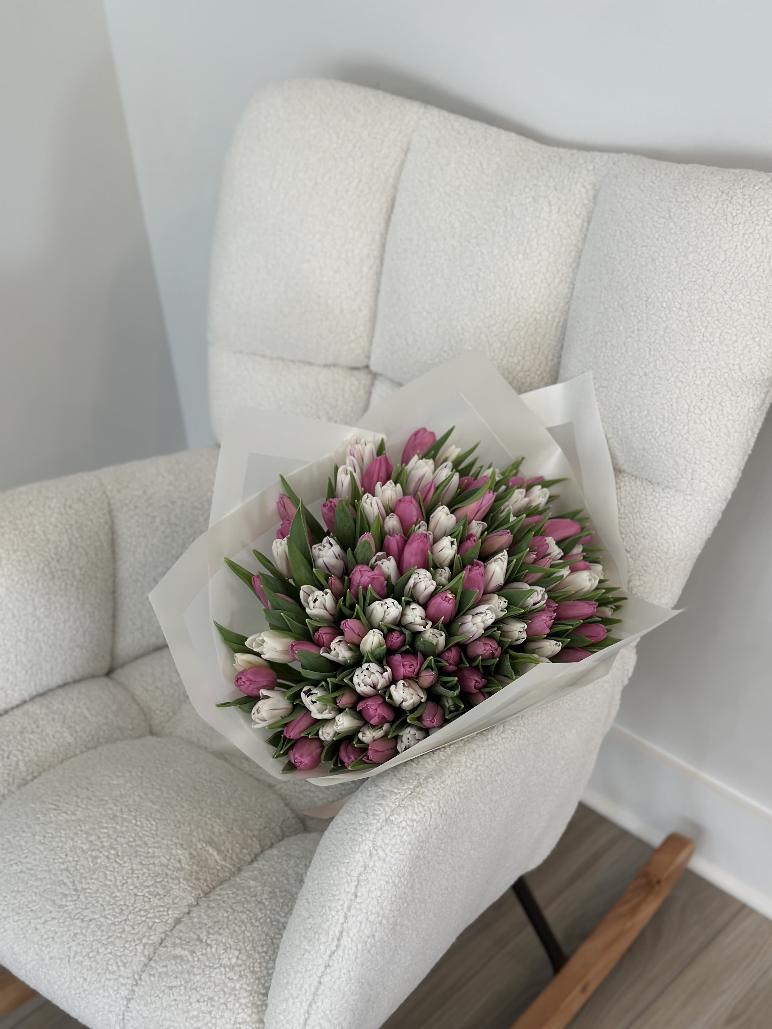 Blush Harmony Tulips - A refined bouquet of fresh pink and creamy white tulips, thoughtfully arranged to create a soft, romantic balance.  Blush Harmony is all about elegance in simplicity — delicate tones, natural greenery, and a clean modern wrap that highlights the beauty of each bloom.  Perfect for birthdays, anniversaries, new beginnings, or simply to remind someone how deeply they are loved.  Fresh. Graceful. Timeless.