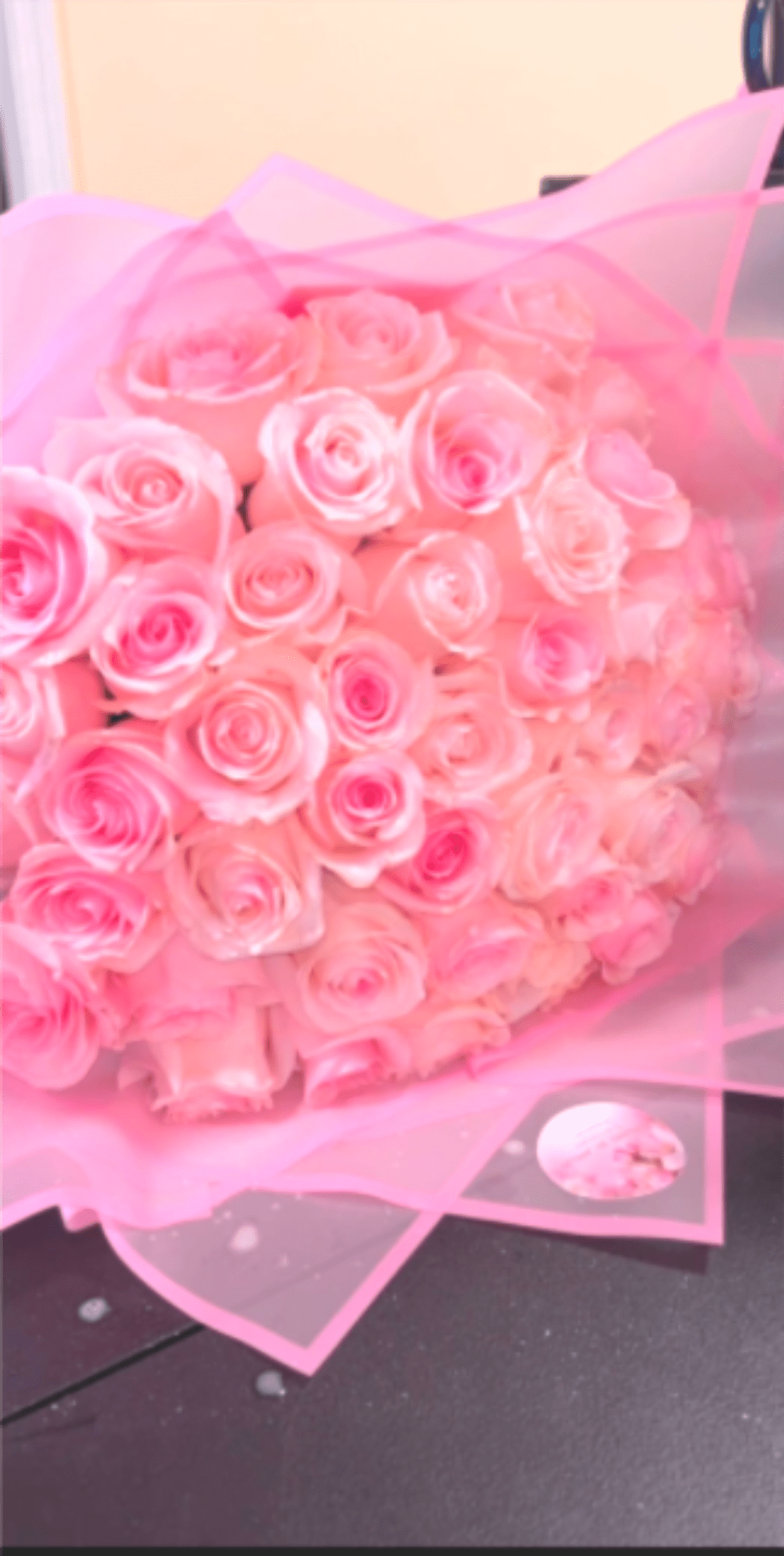 Blush Dreams Rose Bouquet - 50 Pink Roses Luxury Bouquet  Soft, elegant, and full of charm, this stunning bouquet of 50 premium pink roses is the perfect way to express love, admiration, and sweet affection. Handcrafted with care, each rose is selected for its beautiful blush tones, full blooms, and long-lasting freshness, then wrapped in delicate pink presentation paper for a dreamy, romantic finish.  Pink roses symbolize grace, gratitude, and gentle love, making this arrangement ideal for birthdays, anniversaries, congratulations, baby showers, or simply to brighten someone’s day. Whether you’re celebrating a special milestone or sending a thoughtful surprise, this luxurious rose bouquet makes a lasting impression.  Designed by a local florist and available for same-day flower delivery when ordered early.  Details:   50 fresh premium pink roses   Elegant pink wrapping for a luxury presentation   Full, fresh, and long-lasting blooms   Same-day local delivery available  Perfect for: Birthday flowers, anniversary gifts, romantic surprises, congratulations, or just-because flower delivery.  Send a timeless expression of love and elegance with this breathtaking pink rose bouquet.