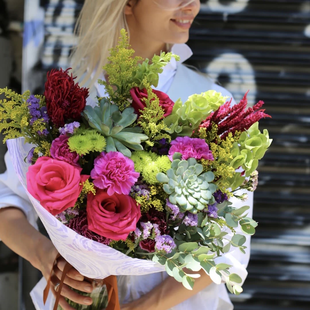 Bright Bouquet  - A joyful, colorful bouquet designed to brighten any day. Featuring vibrant roses, textured carnations, green chrysanthemums, sculptural succulents, delicate fillers, and fresh eucalyptus, this arrangement feels lively, modern, and full of positive energy!