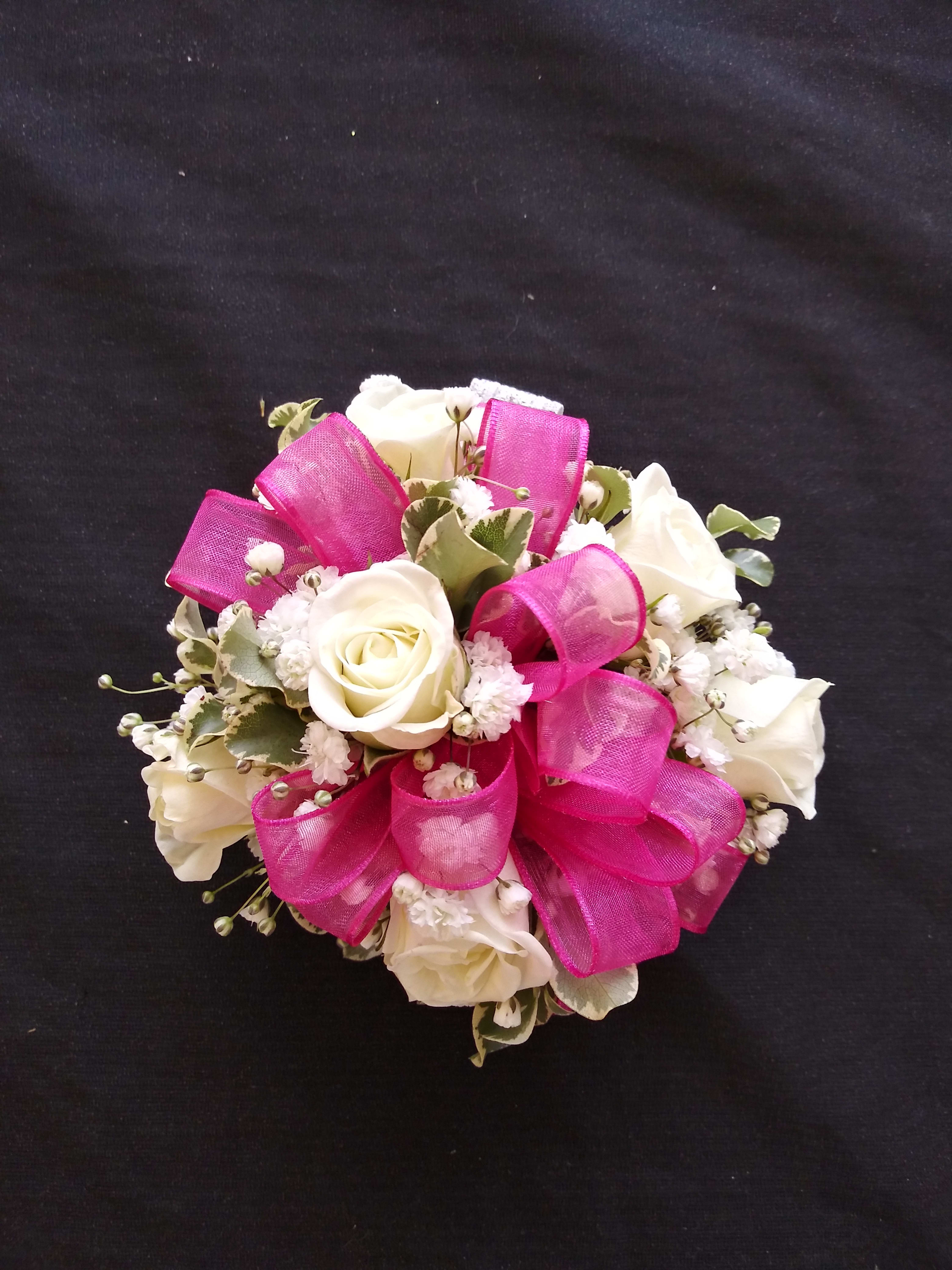 Wrist Corsage With White Spray Roses And Hot pink ribbon - Wrist Corsage with white spray roses, greenery, filler and hot pink ribbon