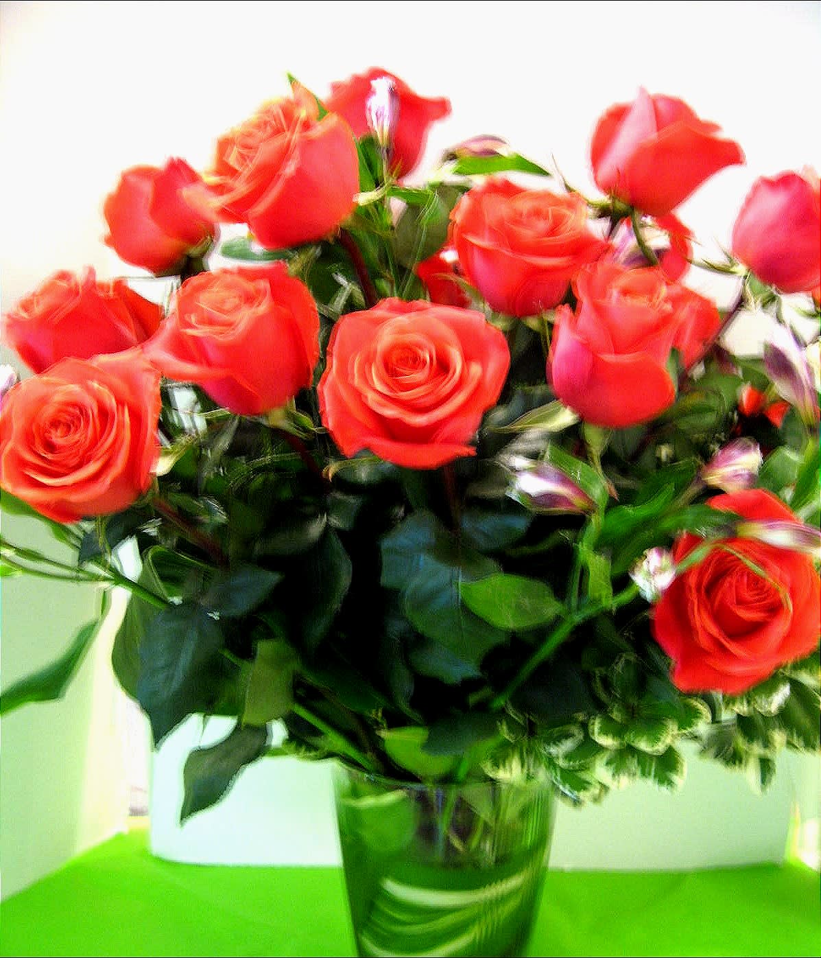Orange Rose Arrangement  (Picture is Deluxe) -  Orange Roses, Assorted Fancy greens, in a Tall Glass Vase