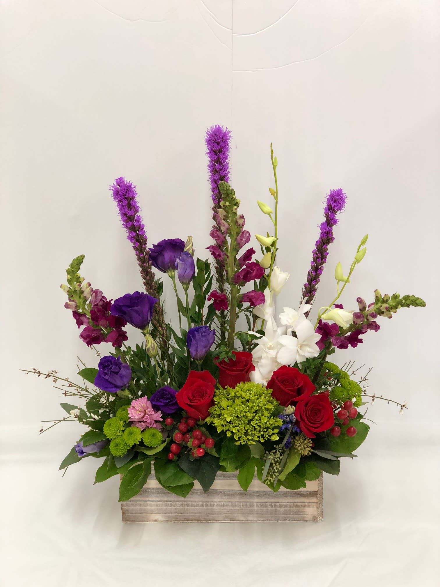 Modern Stunning Beauty - Beautiful assortment of romantic colors arranged together in a modern bamboo wooden container.  Flowers may vary depending on availability but we will make sure style is kept.