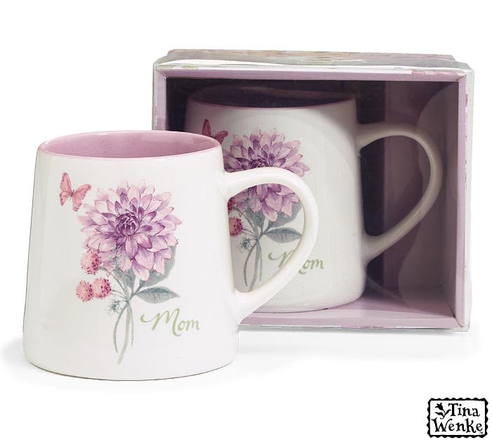 Mom Mug - Single Bloom  - LOCAL DELIVERY AND PICK UP ONLY - Dishwasher safe/FDA approved/Microwave safe.  Ceramic mug with a lavender and pink floral bloom design on a white background. Has the message "Mom" under the bloom and a butterfly next to it. Comes with a color gift box with a clear lid.  3.75"H X 5.25"W X 3.75"D / 2.75"Opening 16 ounces