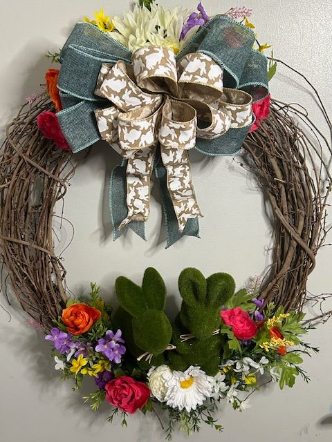 Topiary Bunny Wreath - An artificial spring wreath with bright spring flowers and topiary bunnies. Perfect for spring or easter. 