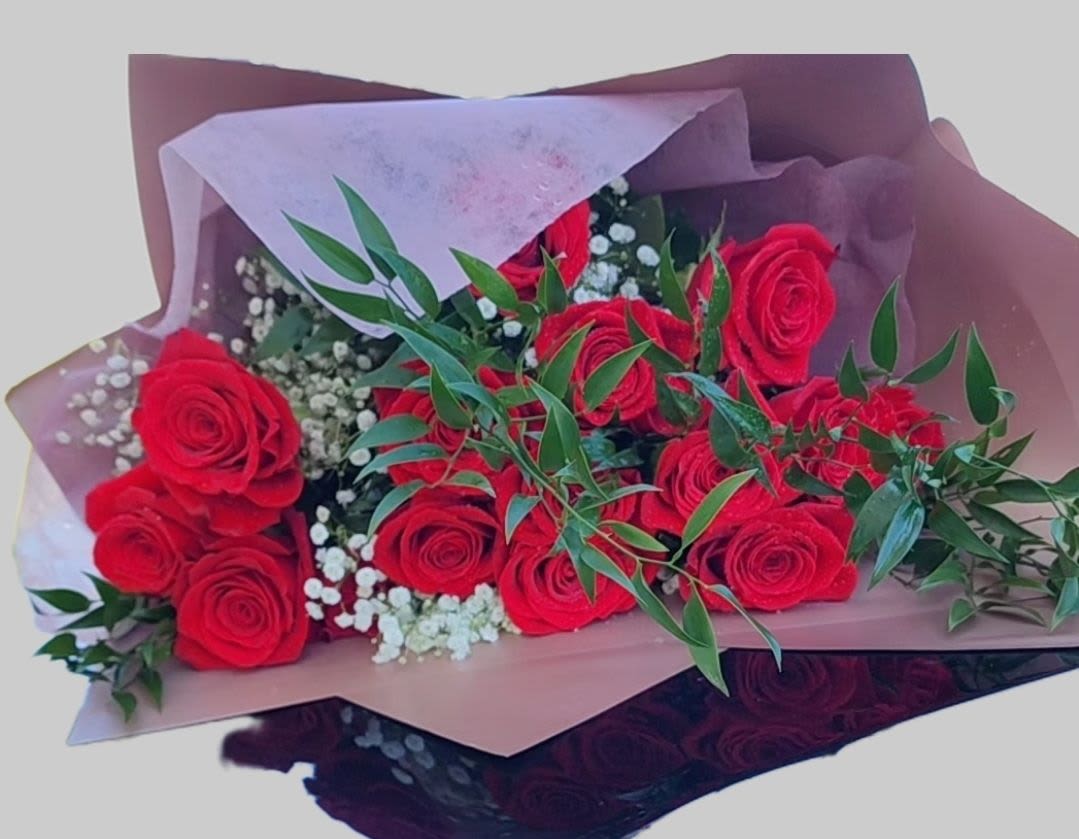  Classic Red Roses - Timeless and classic, red roses never go out of style. Set the tone for romance with a lovely gift that’s sure to delight.  Lush red roses and baby’s breath are lavishly designed to create a moment they’ll never forget.