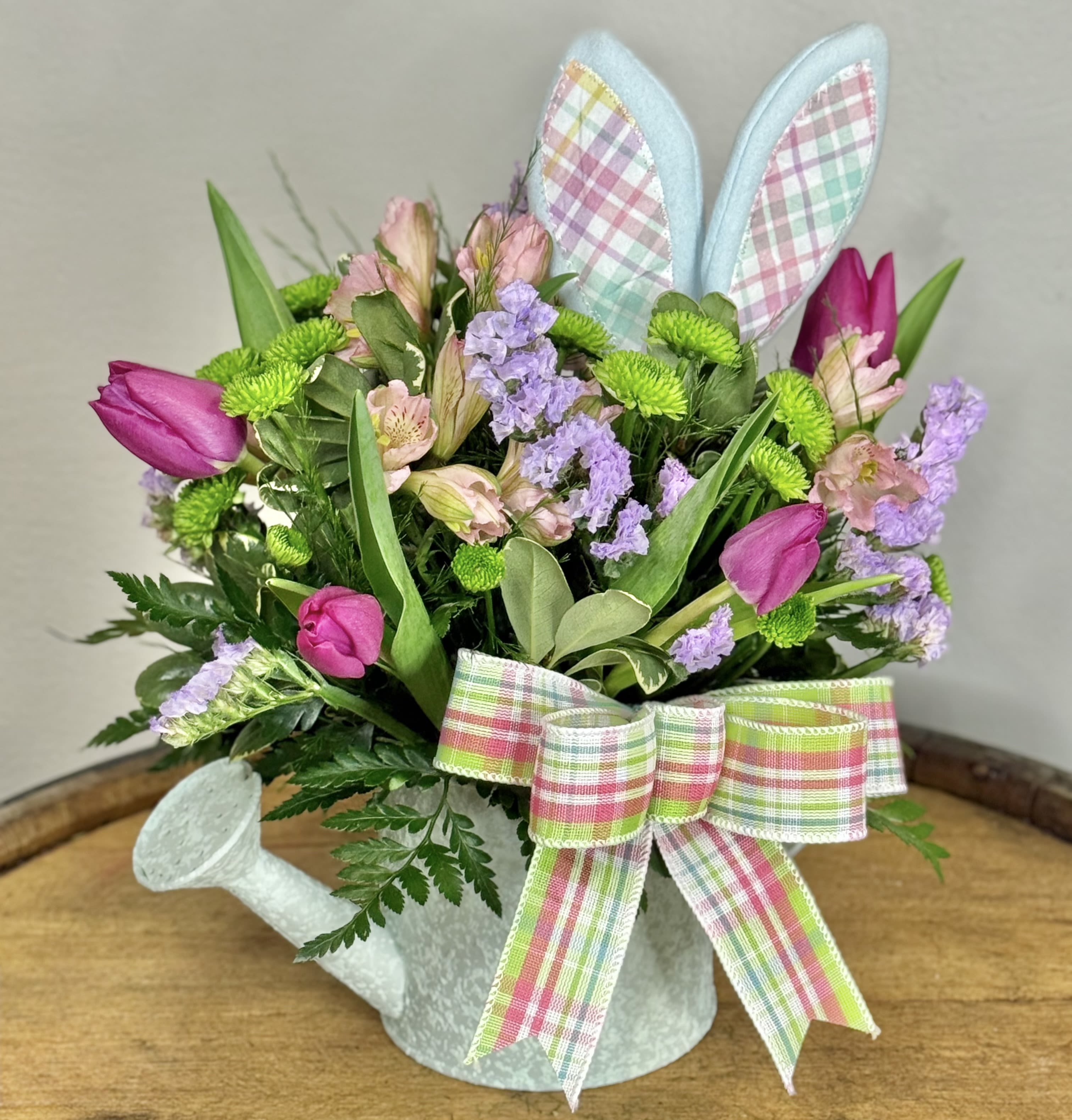 Hoppy Little Daydream - This textured watering can is giving pastel garden party with a Secret Bunnies Association. Between the plaid ears and the punch-drunk pink tulips this floral design feels playful, fresh and storybook chic. 