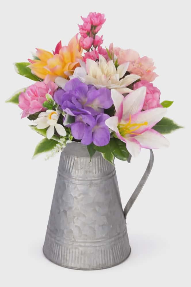Pail of Spring Silk Bouquet - A watering can pail arranged with artificial spring silk flowers. Wonderful gift for anyone to have that will last for years to come.  14" Tall 