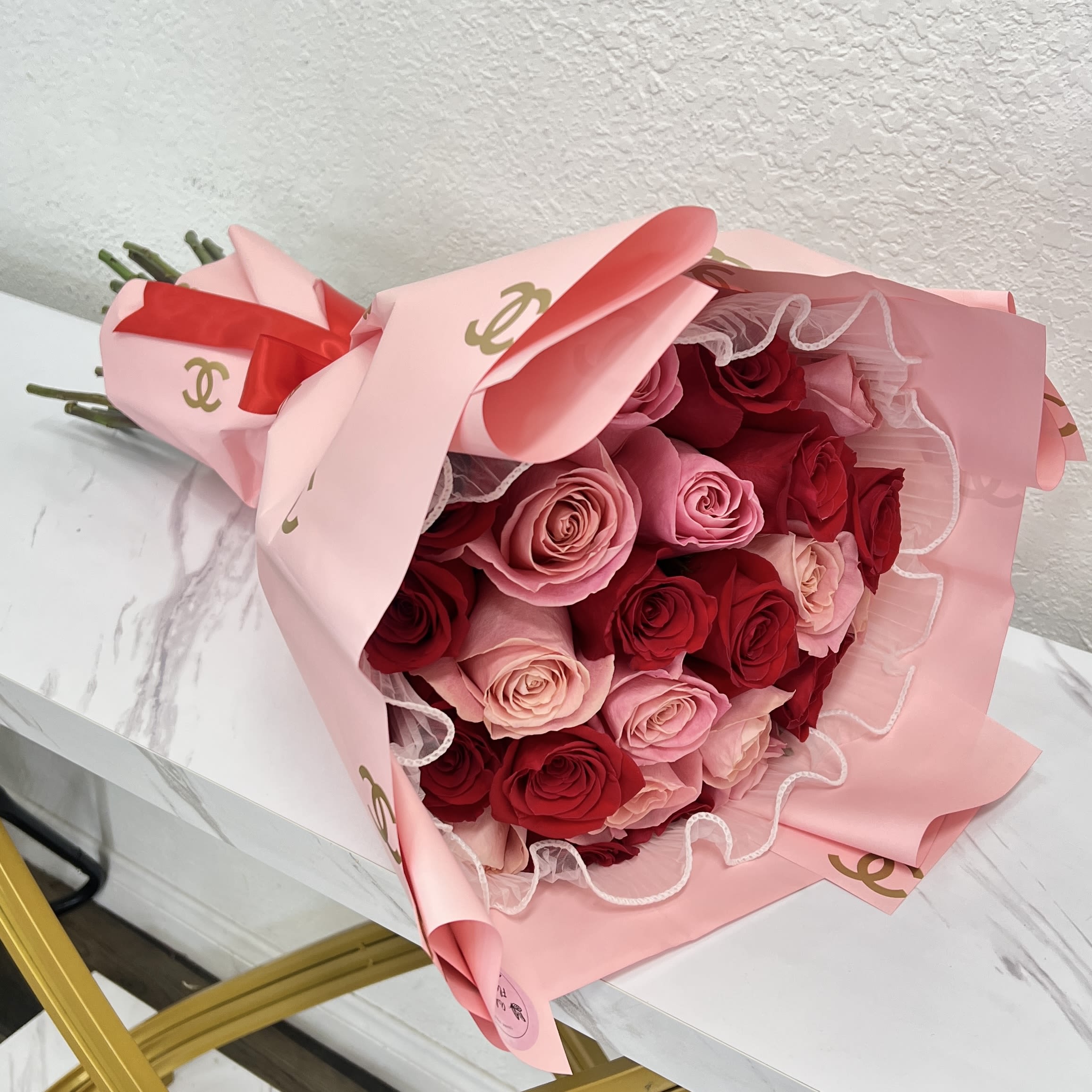 25 Roses - Red And Pink With Pink Wrapping Paper - Buyer will receive 25 roses in total 