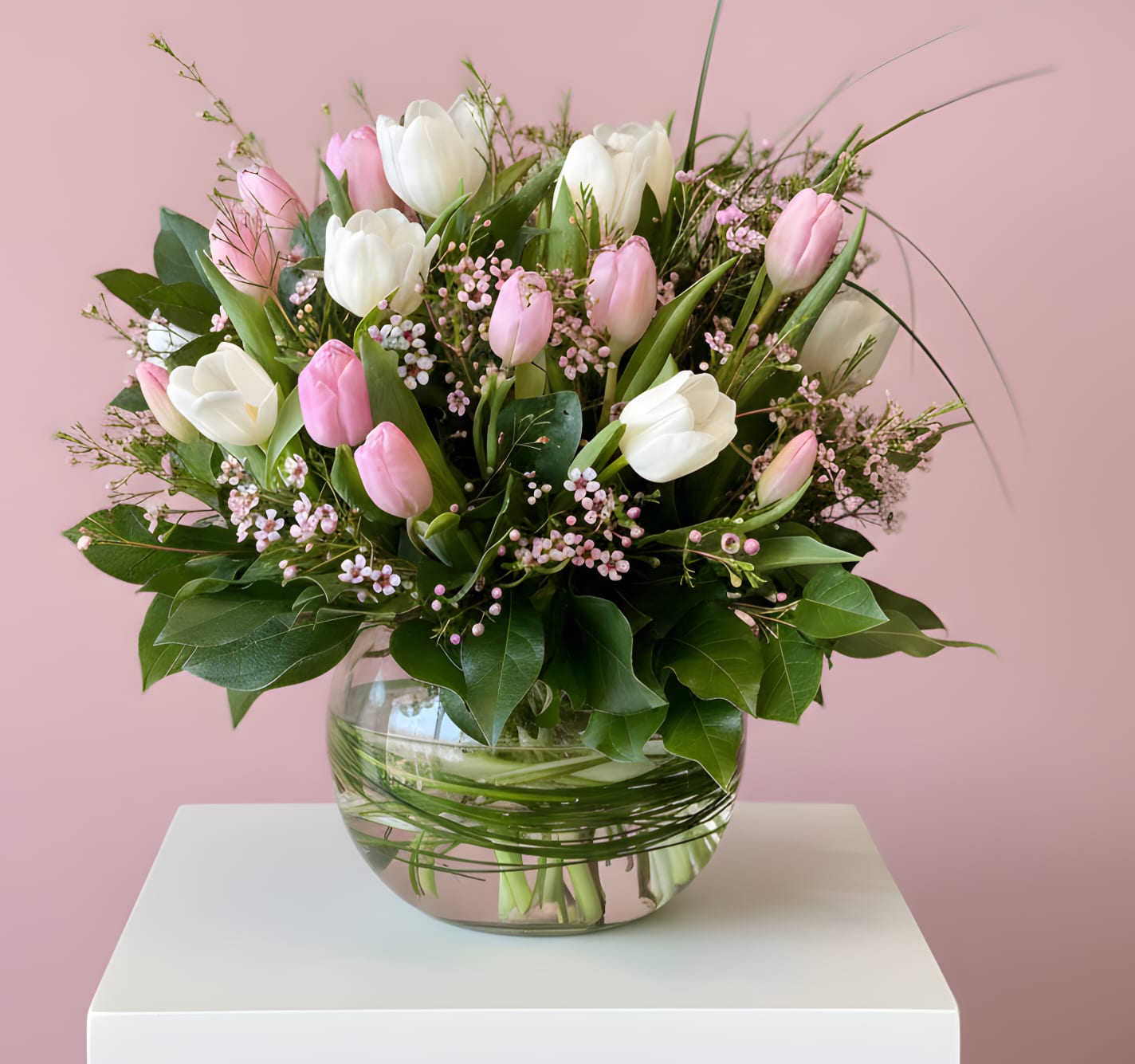 Love Is In The Air - Send a beautifully arranged assortment of Valentine Themed Tulips. These colors only will come in either white, pink, &amp; red for the holiday. Please let us know specific combination and we will mark this as a preferred combo. Specific Colors may not be guaranteed based on request.  