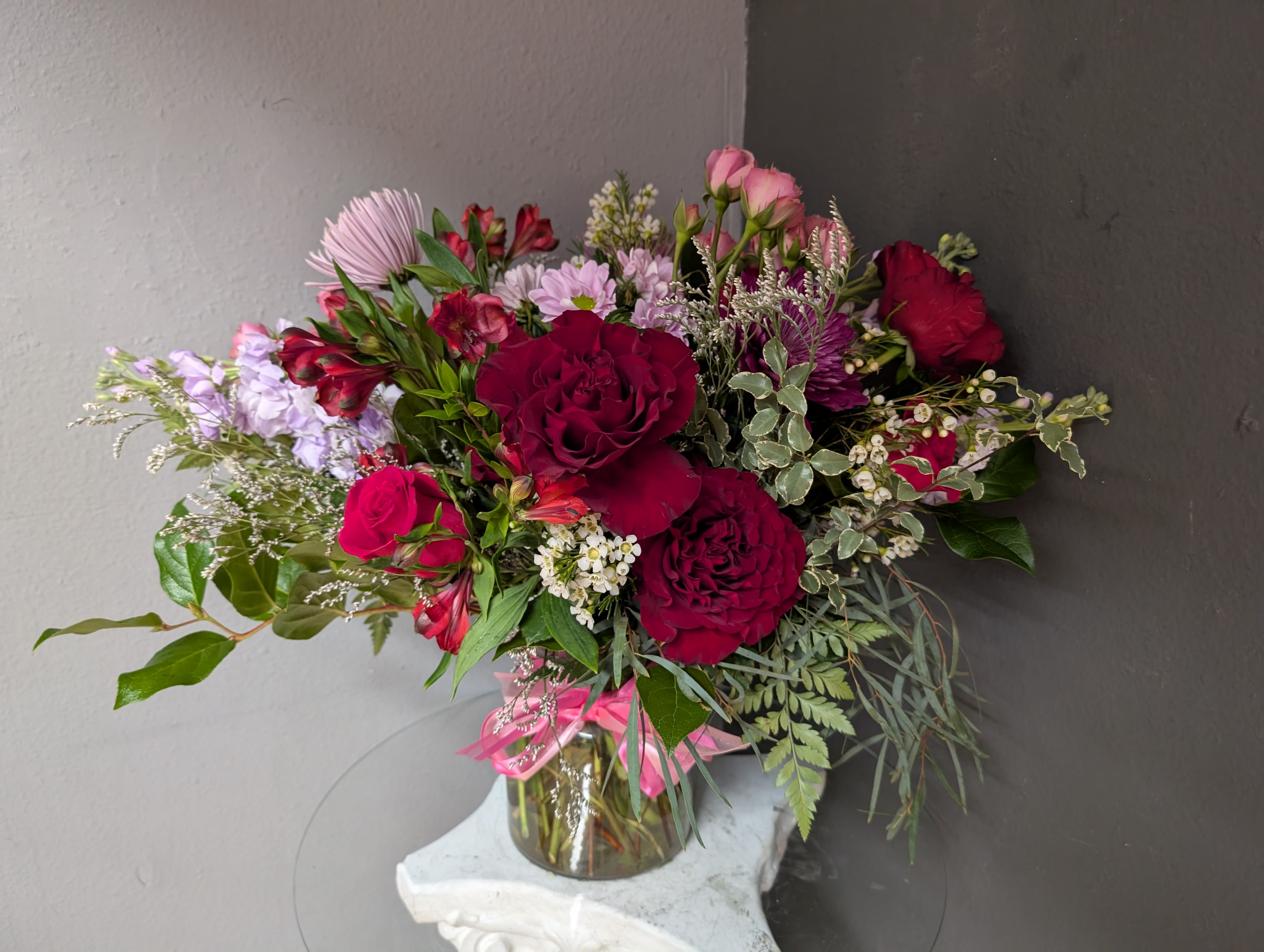 #753 Designer's choice floral arrangement  - This beautiful flower arrangement of fresh mixed seasonal blooms is made by local designers in the heart Orange California. Hand crafted and perfect for every occasion, from birthdays and new babies to sympathy and just because. The best choice to show you are thinking of that special someone. Can be sent as a local delivery or in-store pickup. This is an original, one of a kind arrangement. Order now before it's too late!