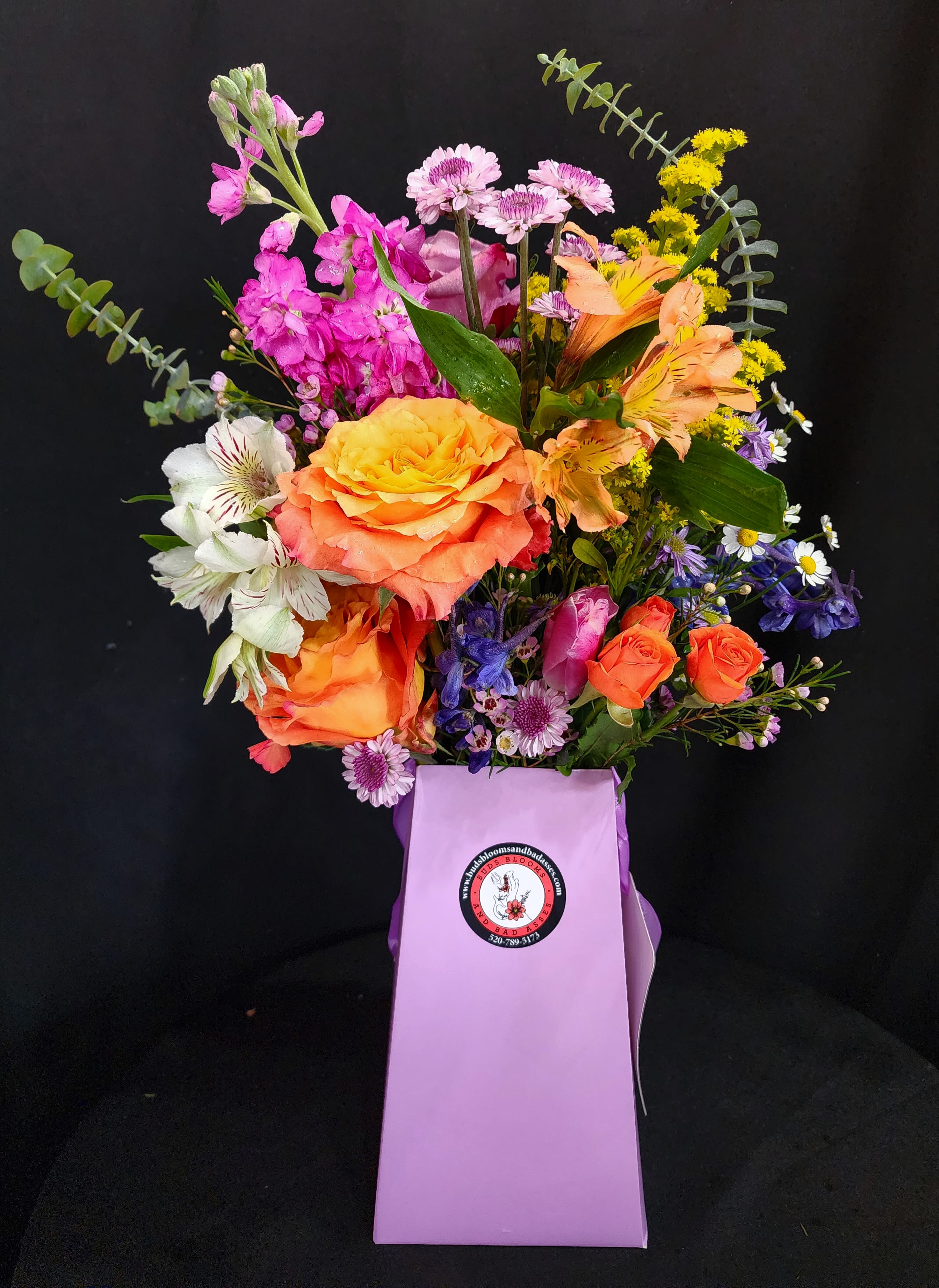 Boxful of Love - Kick the glass vase to the curb and be earth friendly. Seasonal flowers in a recyclable floral box. 4 color options-Black, Red, Pink and Cream