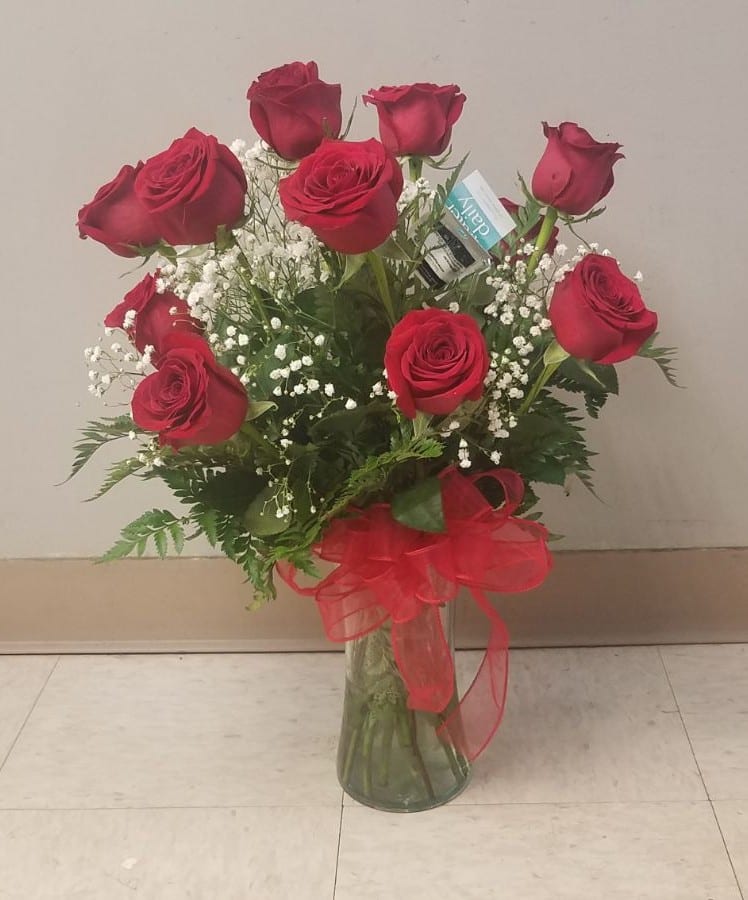 A Dozen Red Roses - One dozen beautiful red roses with babies breath.