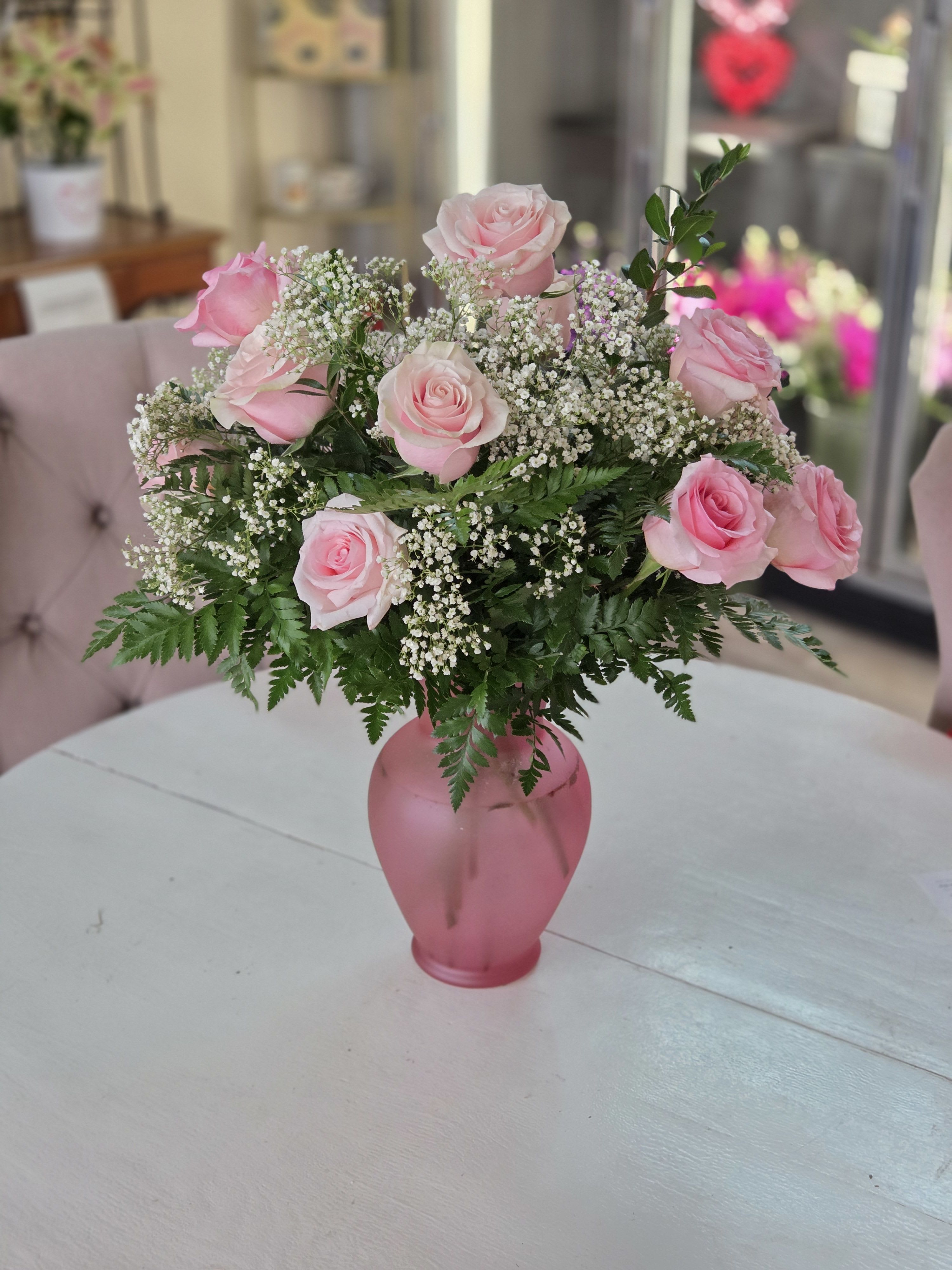 Dozen Long Stemmed Pink Roses  - These pink roses are cheerful and fun!  