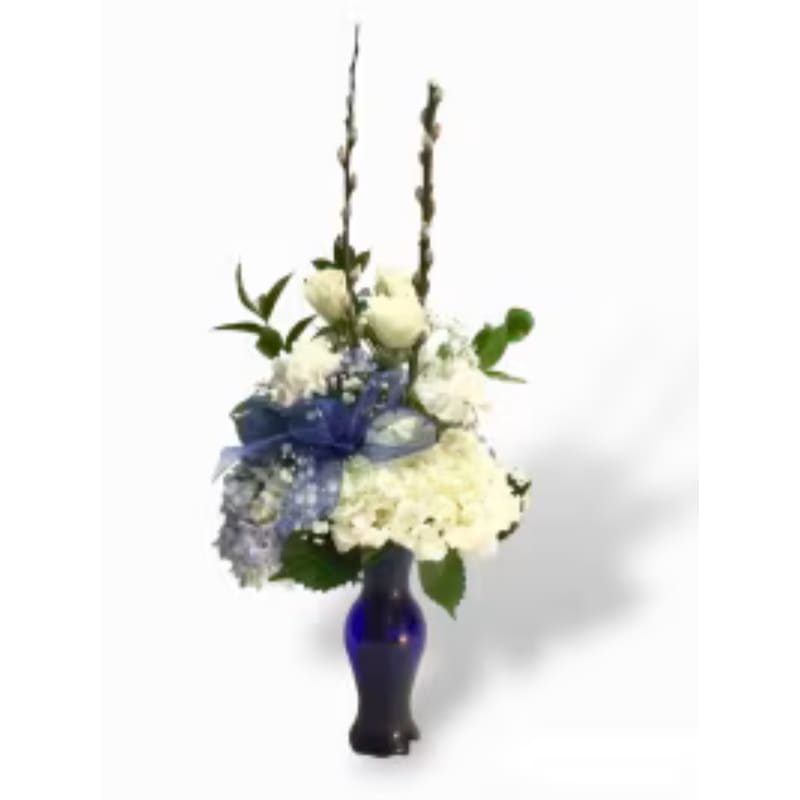 Sapphire elegance - Sapphire elegance sapphire blue vase filled with white and blue hydrangea roses carnations babies dress and a sapphire blue ribbon