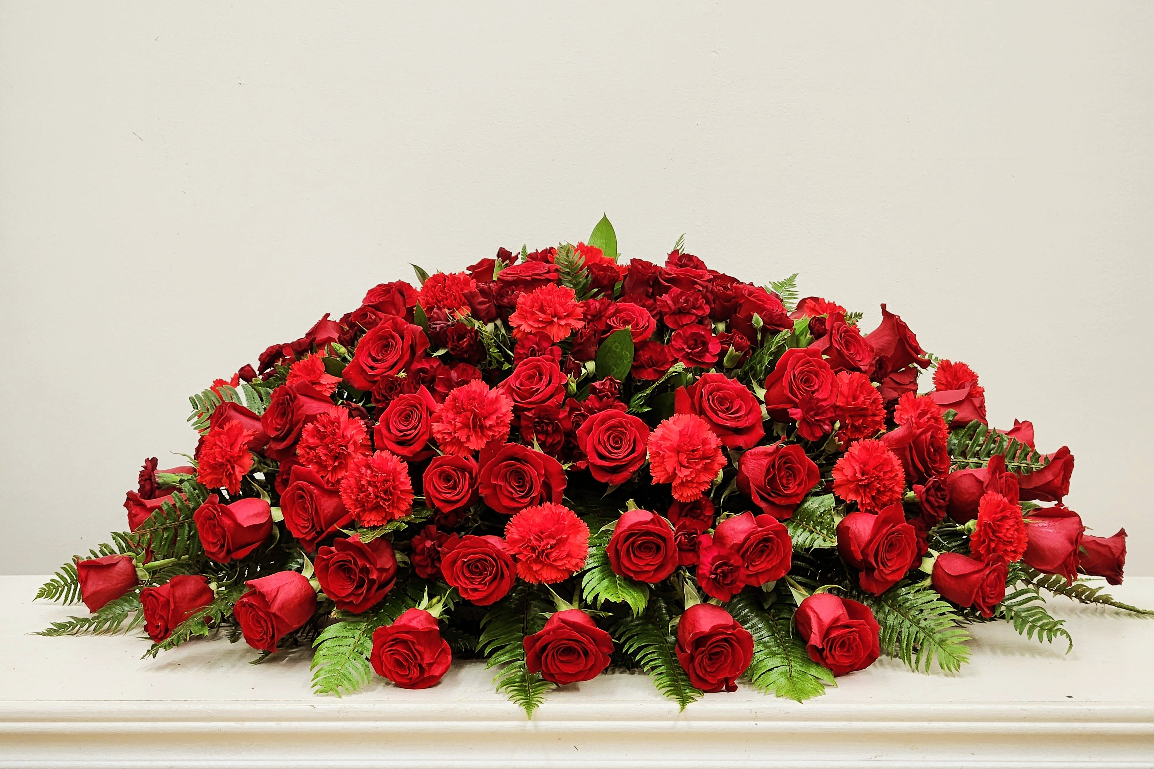 Vivid Life Casket Spray  - Vivid Life Casket Spray honors a life full of strength and gentle grace. This thoughtfully crafted arrangement reflects the enduring spirit of your loved one, delivering a heartfelt tribute that will be remembered forever. Its vibrant blooms symbolize the vivid moments shared, offering comfort and support during a difficult time. Premium - As Pictured: 50" L BY 34" D
