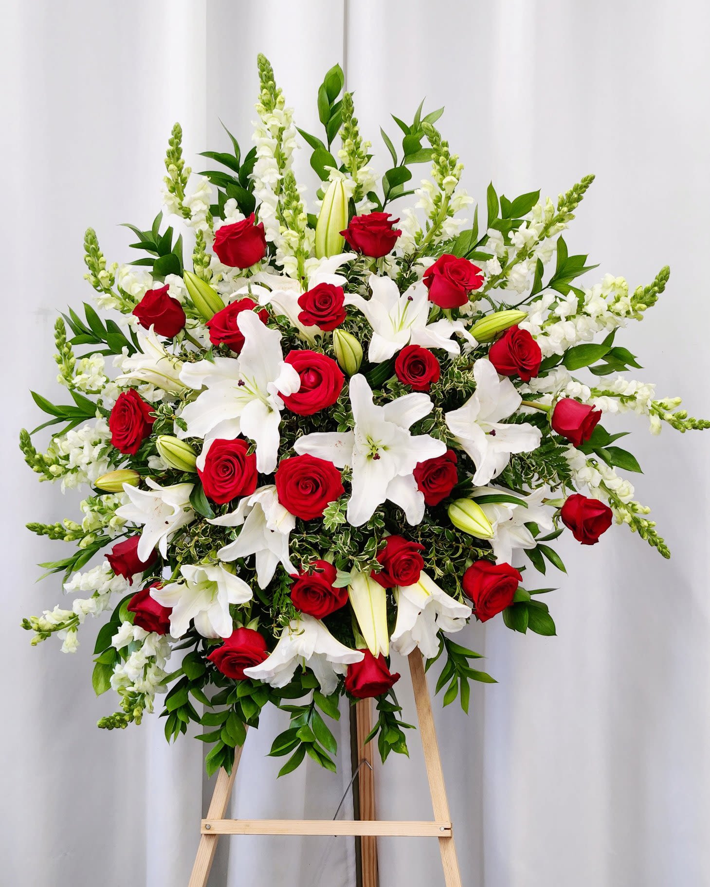 Healing Thoughts Spray - Offer comfort and hope with this Healing Thoughts Spray. Designed to uplift spirits and convey heartfelt care, it’s the perfect way to send a gentle reminder that someone is in your thoughts during difficult times. Its soothing presence helps bring calm and warmth when it’s needed most.  Approximate Size Without Stand:  Standard: 20" x 28"  Deluxe: 25" x 32"  Premium - As Pictured: 32" x 42"