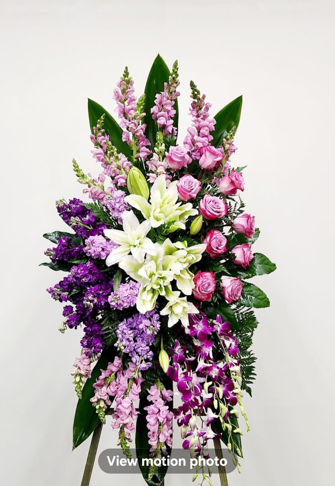 Memorable Soul Spray - Celebrate a cherished soul with the Living Spirit Spray. This beautiful and elegant spray honors lasting bonds, offering a gentle, heartfelt tribute for someone who is loved forever. Its soothing presence helps keep memories alive, providing comfort and support during moments of remembrance...  Approximate Size Without Stand:  Standard: 20" x 28"  Deluxe: 25" x 32"  Premium - As Pictured: 32" x 42"