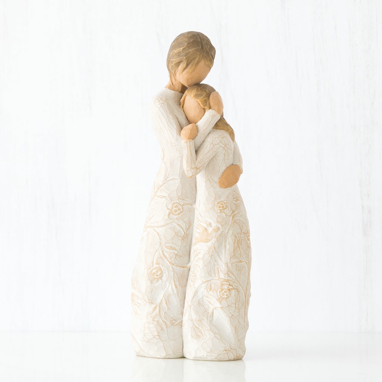 Close to Me  - A mother/daughter figure that expresses the connection, yet freedom, which exists in the best of relationships, near or far. A Mother's Day gift, graduation, wedding, birthday gift… a reminder of closeness even when apart.