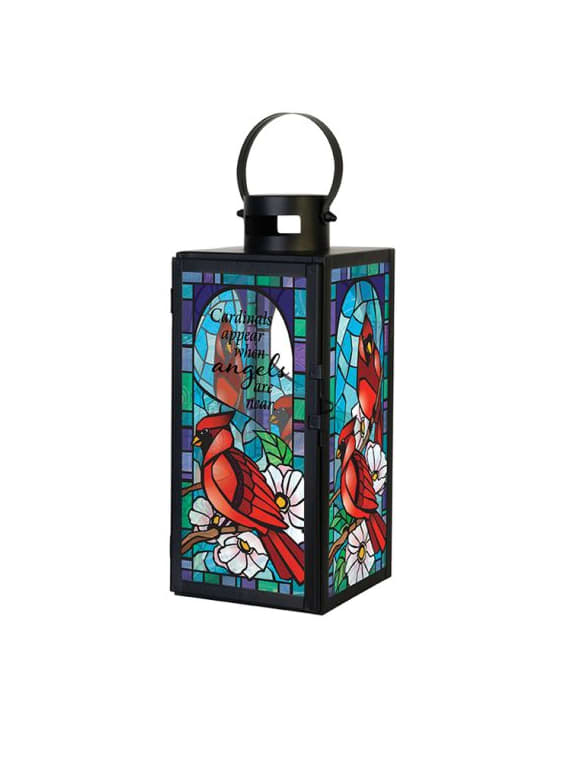 "Cardinals Appear" Stained Glass Lantern - Our stained glass lanterns are made with high-quality black finish. They come inscribed with sentimental quotes amid beautiful stained glass style artwork and a charming flameless LED candle. Suitable for hanging or use as a freestanding item. Recommended as an accent in floral arrangements for many occasions. It can be purchased individually or with an accompanying floral arrangement (Deluxe).