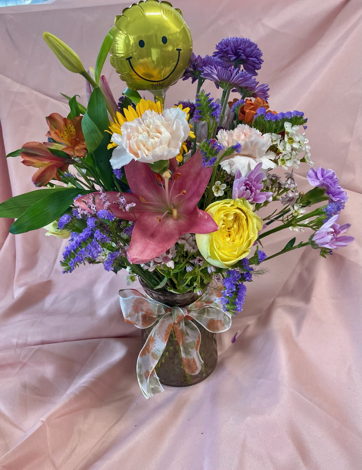 Happy Bouquet - vibrant mixed bouquet including gerbera daisies and roses.