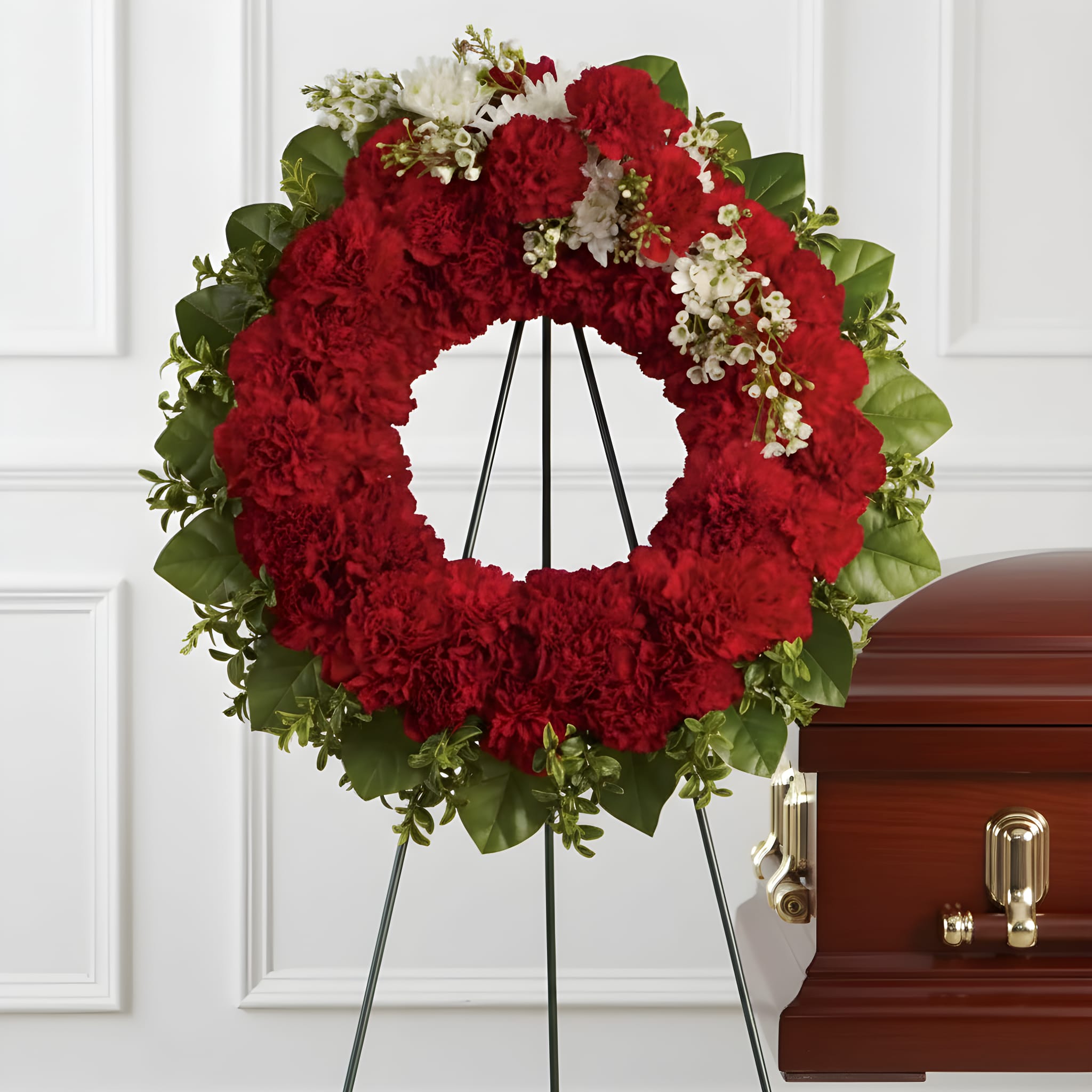 An Unbreakable Bond Wreath - The dazzling red carnations that make up this respectful wreath signify your love and admiration for the deceased, while sending your hope for brighter days to those in attendance.